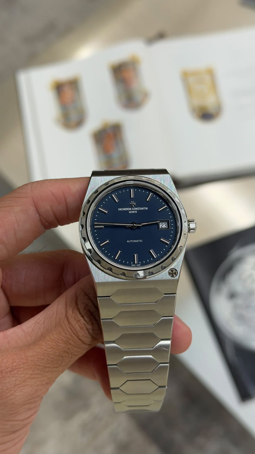 May be an image of wrist watch and text