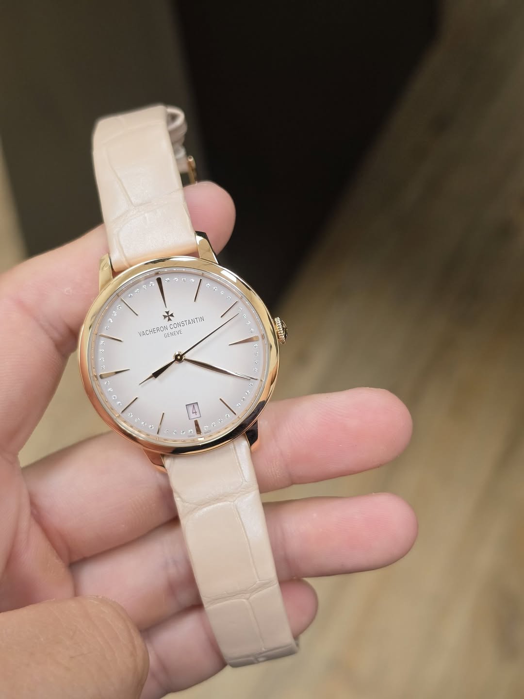 May be an image of wrist watch and text