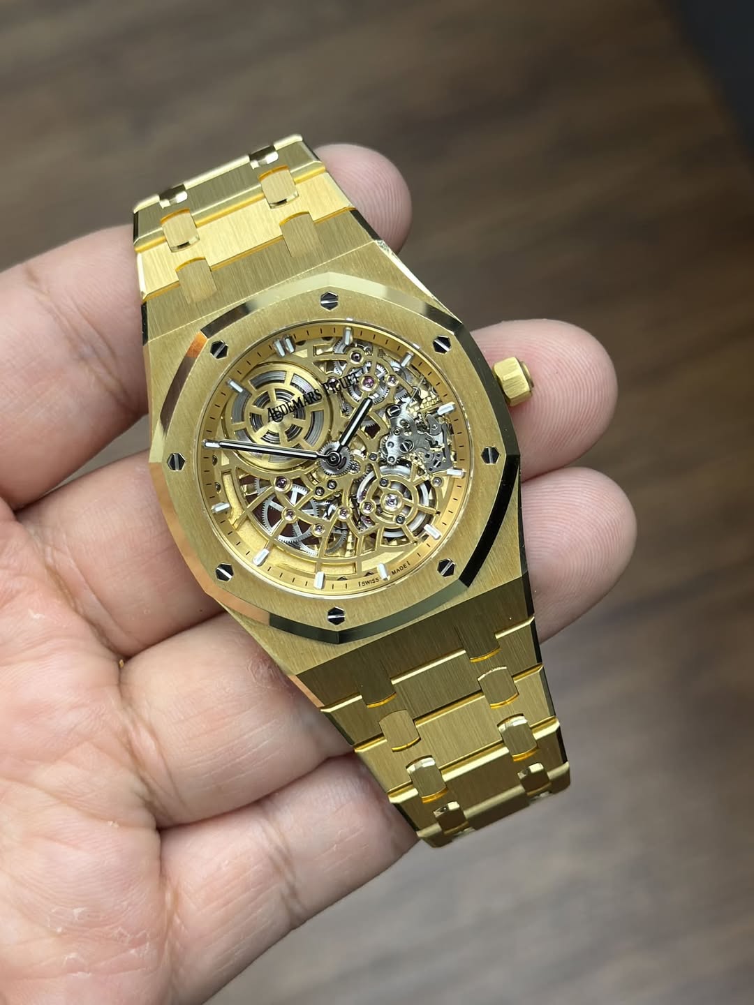 May be an image of wrist watch and text