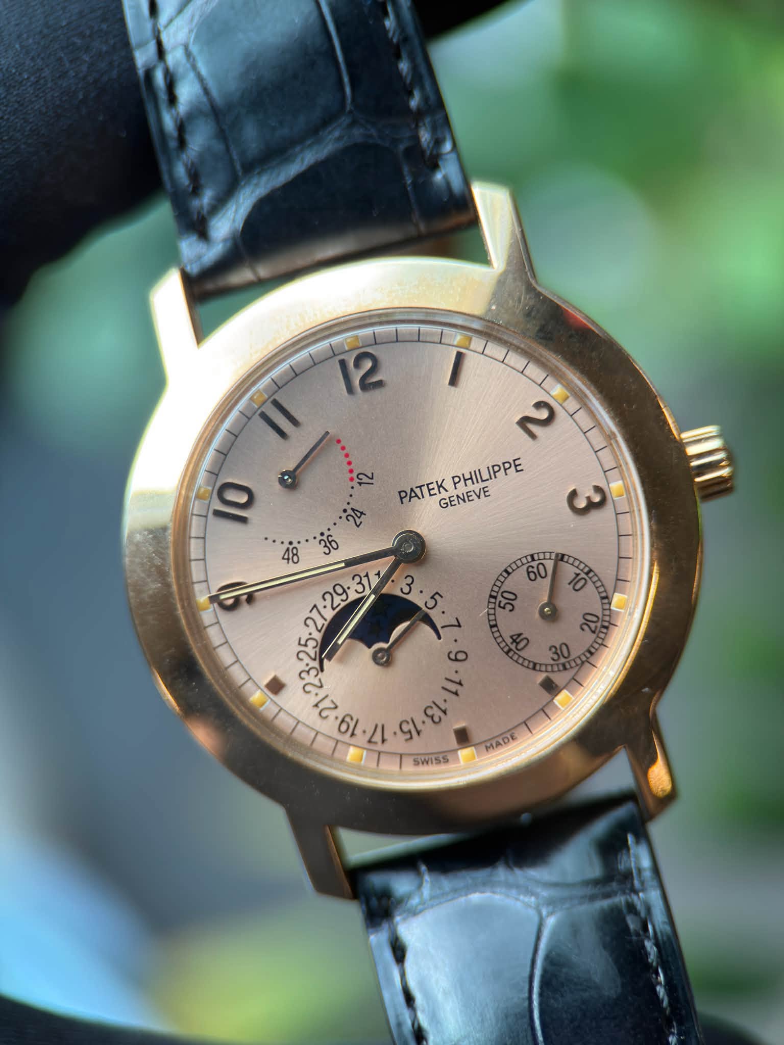 May be an image of wrist watch and text