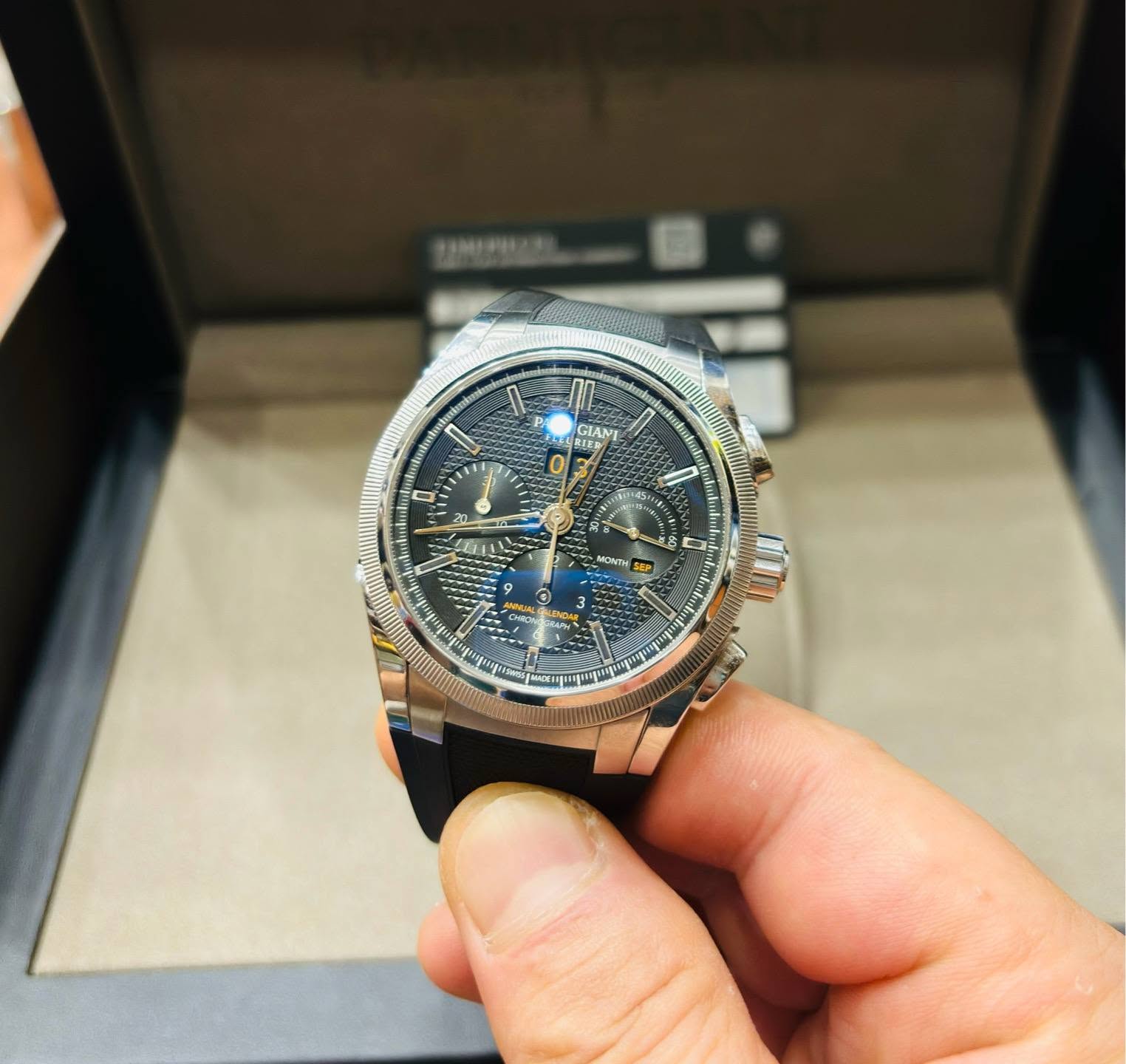 May be an image of wrist watch and text