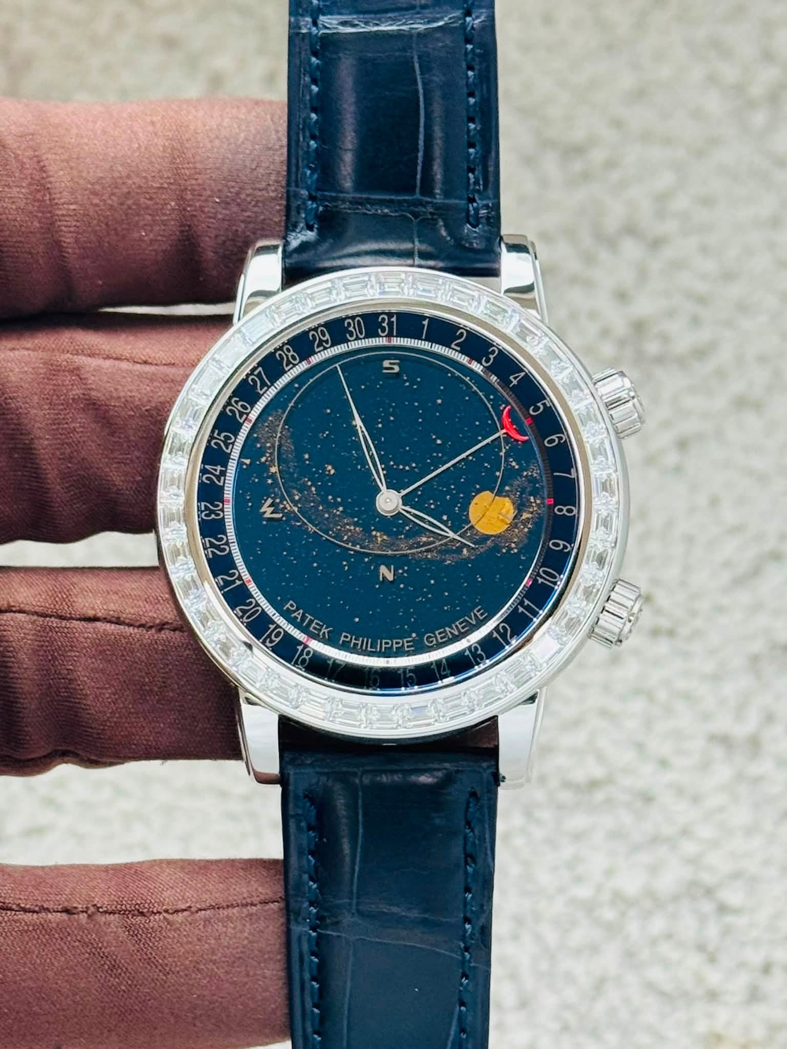 May be an image of wrist watch and text