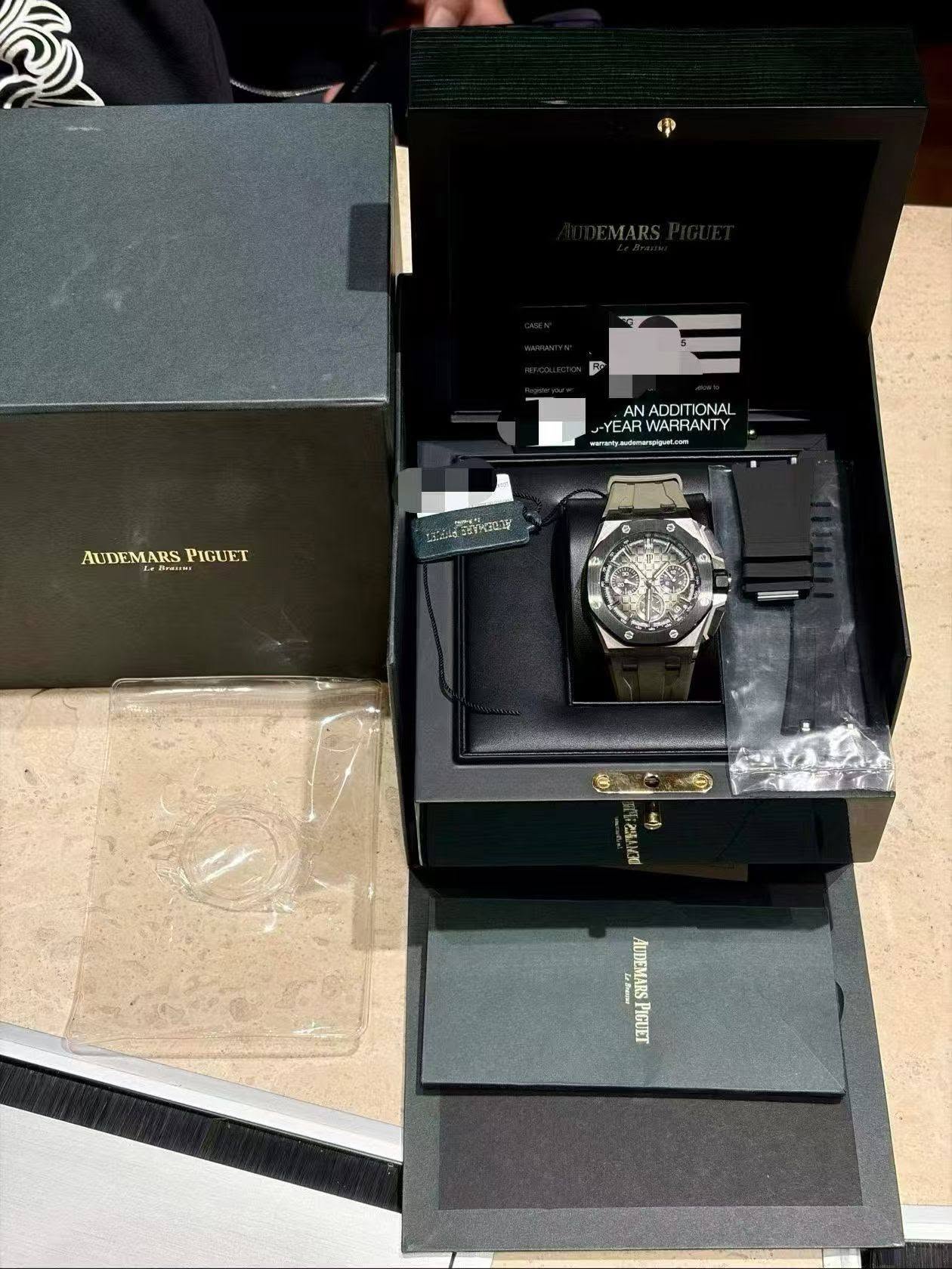 May be an image of digital watch and text that says 'F NADDITIONAL ONAL ADDITK J-YEAR WARRANT J-YEARWARRANTY ANADDITIONAL ANTY WARRA ) AUDEMARSPIGUET ผป AUDEMARS PIGUET عاشدر…
