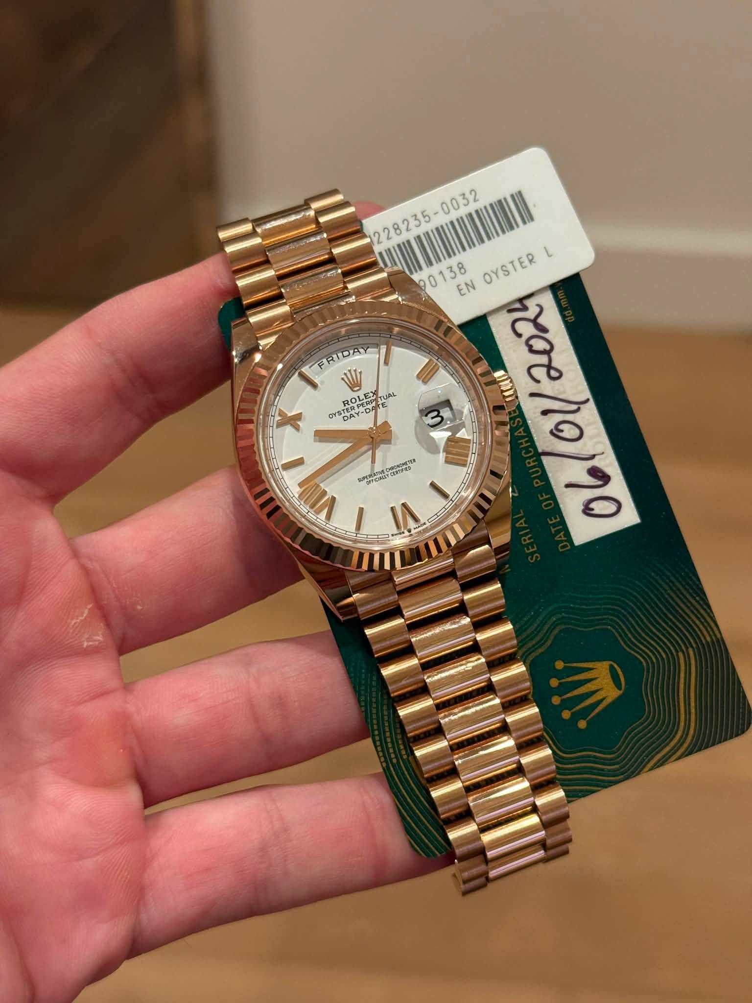 May be an image of wrist watch and text