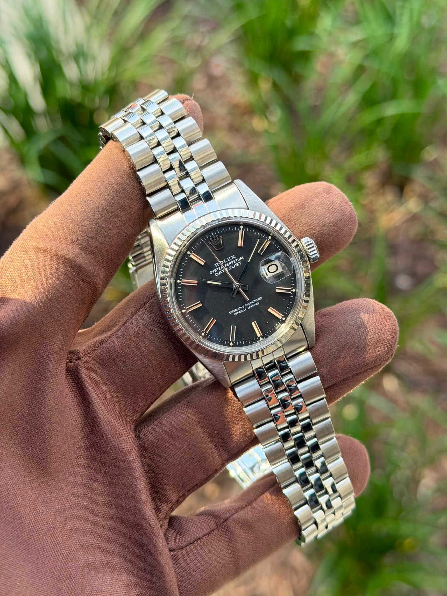 May be an image of wrist watch and text