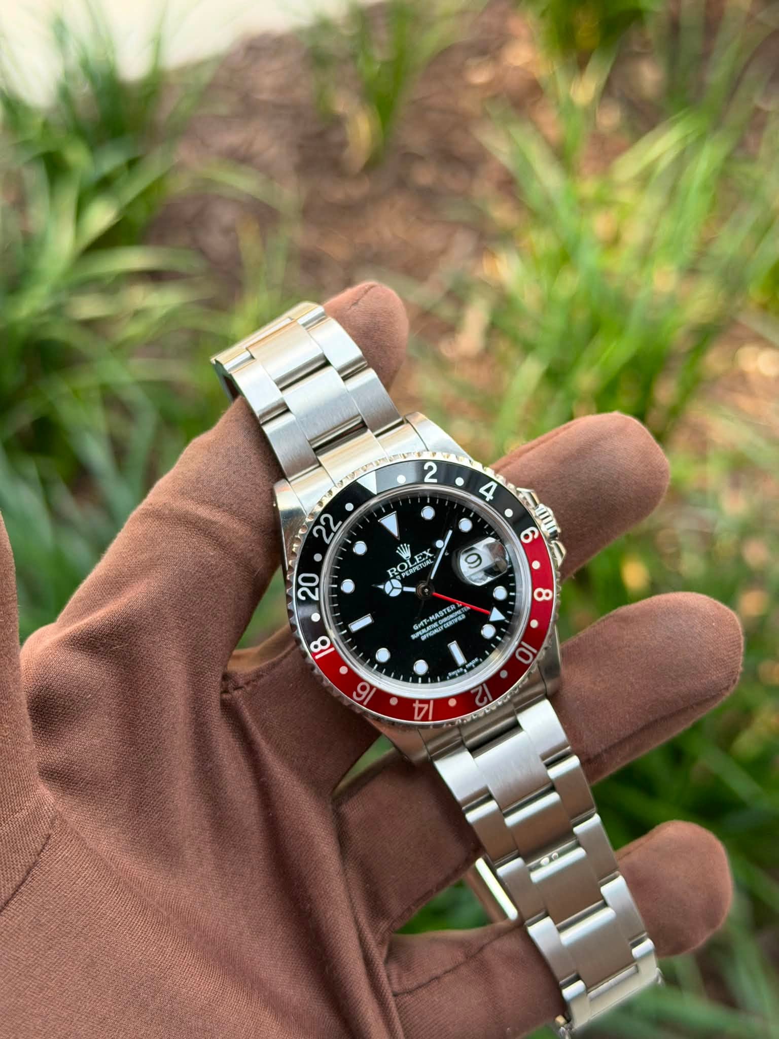 May be an image of wrist watch and text