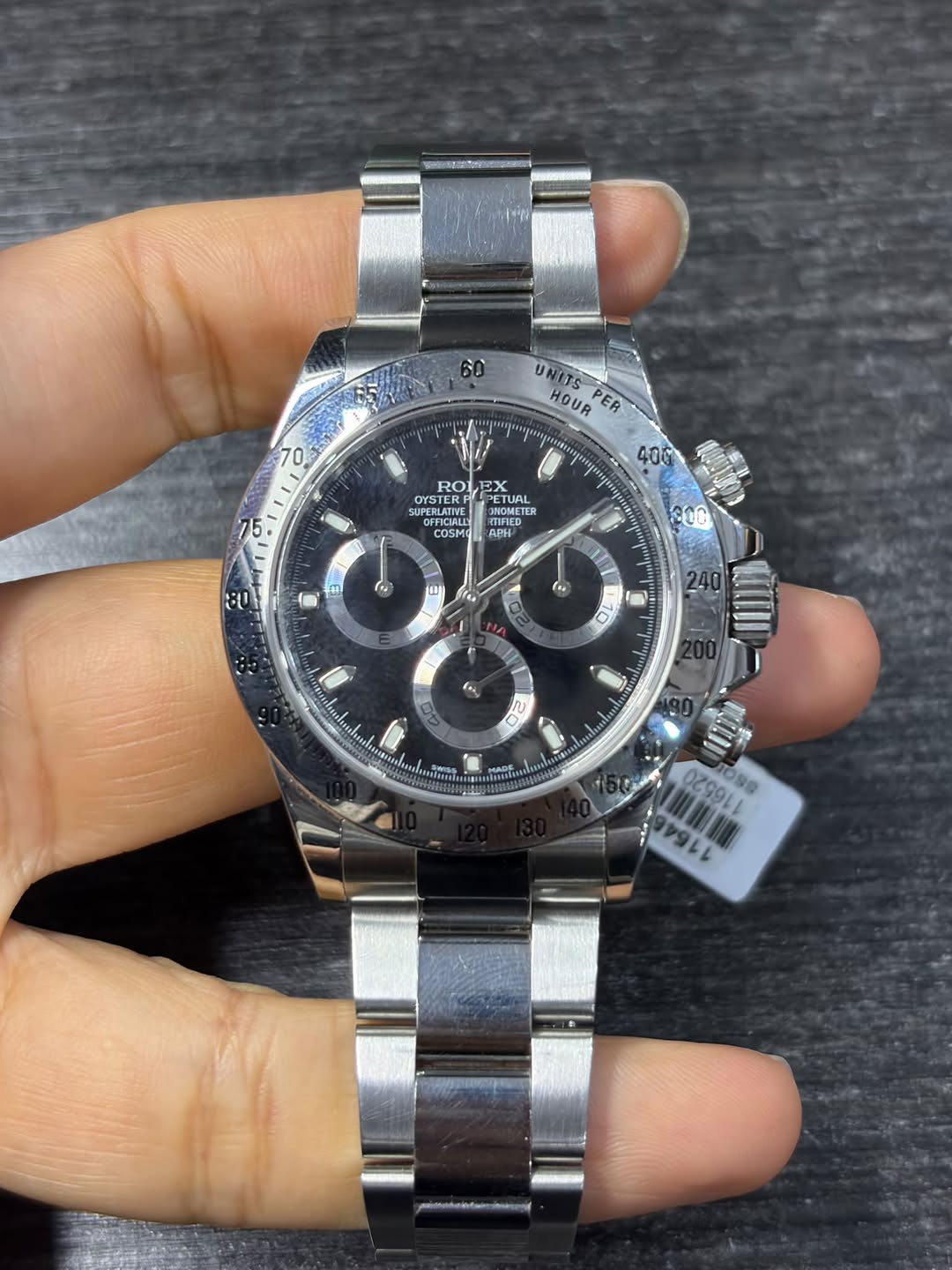 May be an image of wrist watch and text