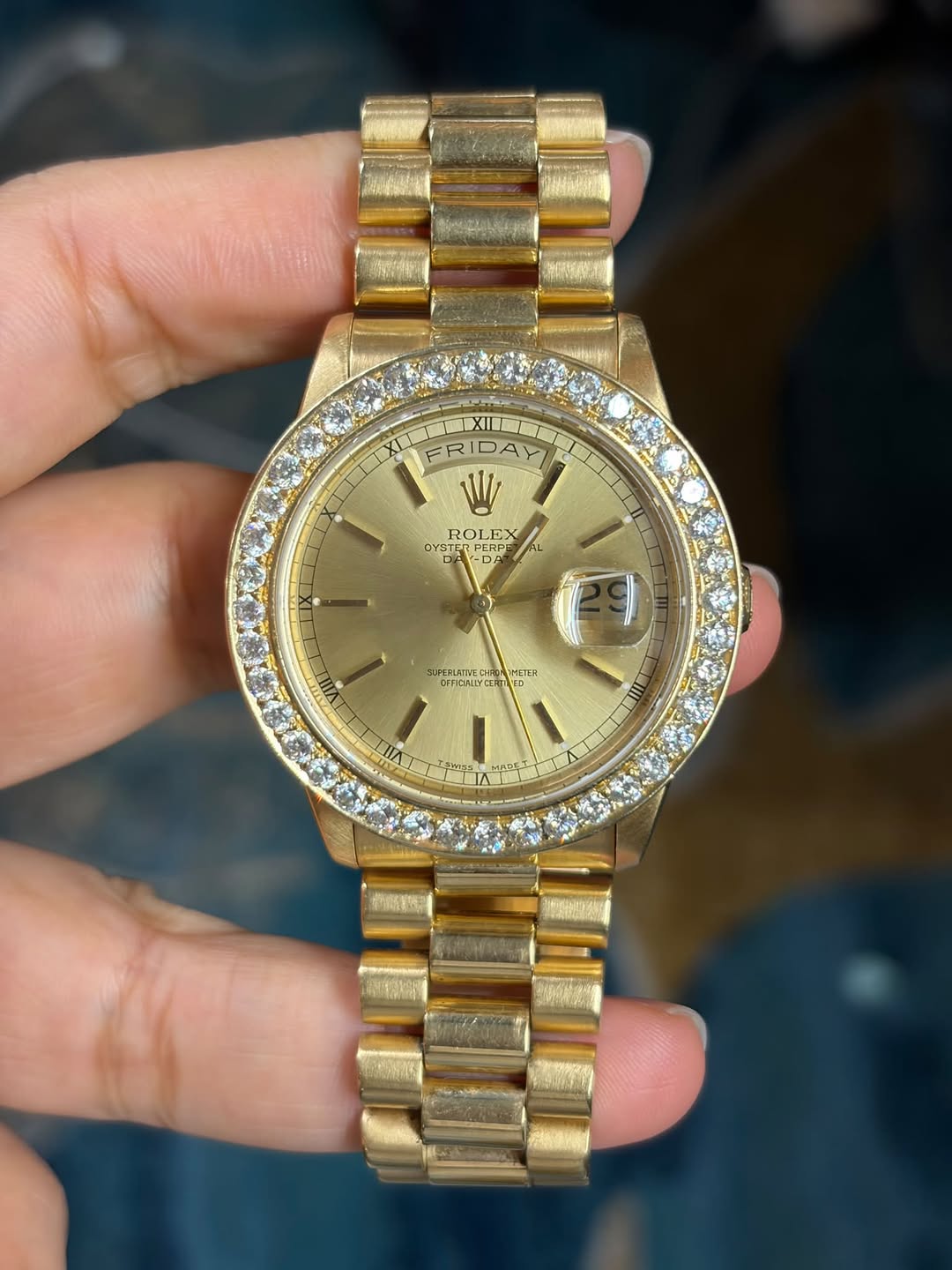 May be an image of wrist watch and text