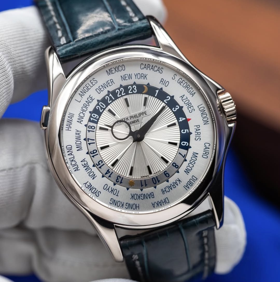 May be an image of wrist watch and text that says 'PHILIPPE IO CARACAS ANGELES DENVER 21 22 23 NEW YORK RIO S. GEORGIA 1 2 3 AZORES LONDON HAWAII L. ANCHORAGE OWa MIDWAY 5 PARIS…