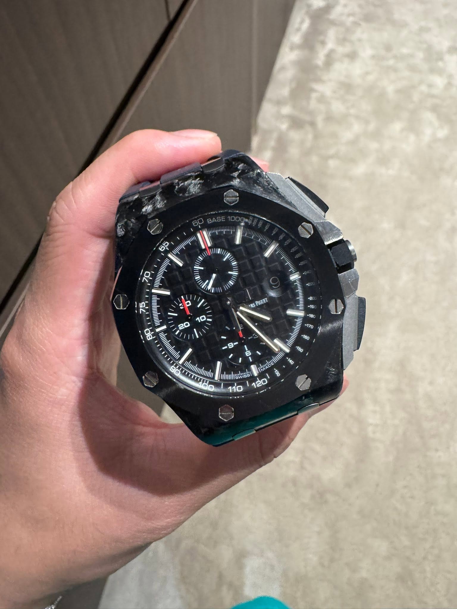 May be an image of digital watch and text