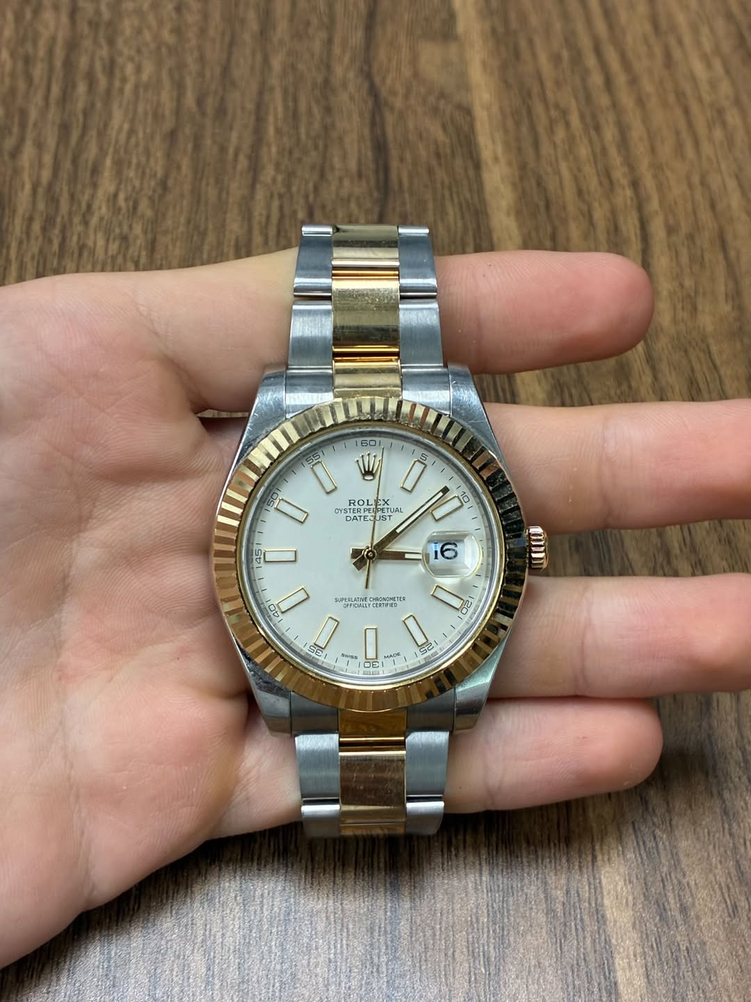 May be an image of wrist watch