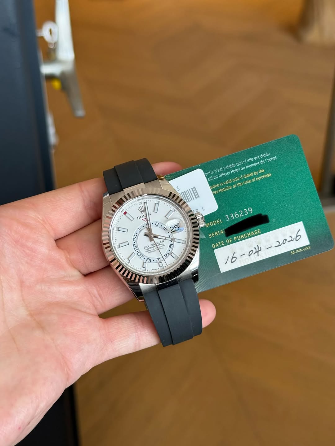 May be an image of wrist watch and text