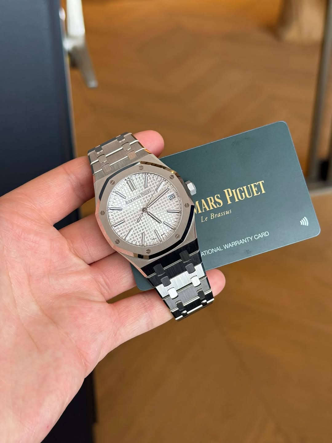 May be an image of wrist watch and text