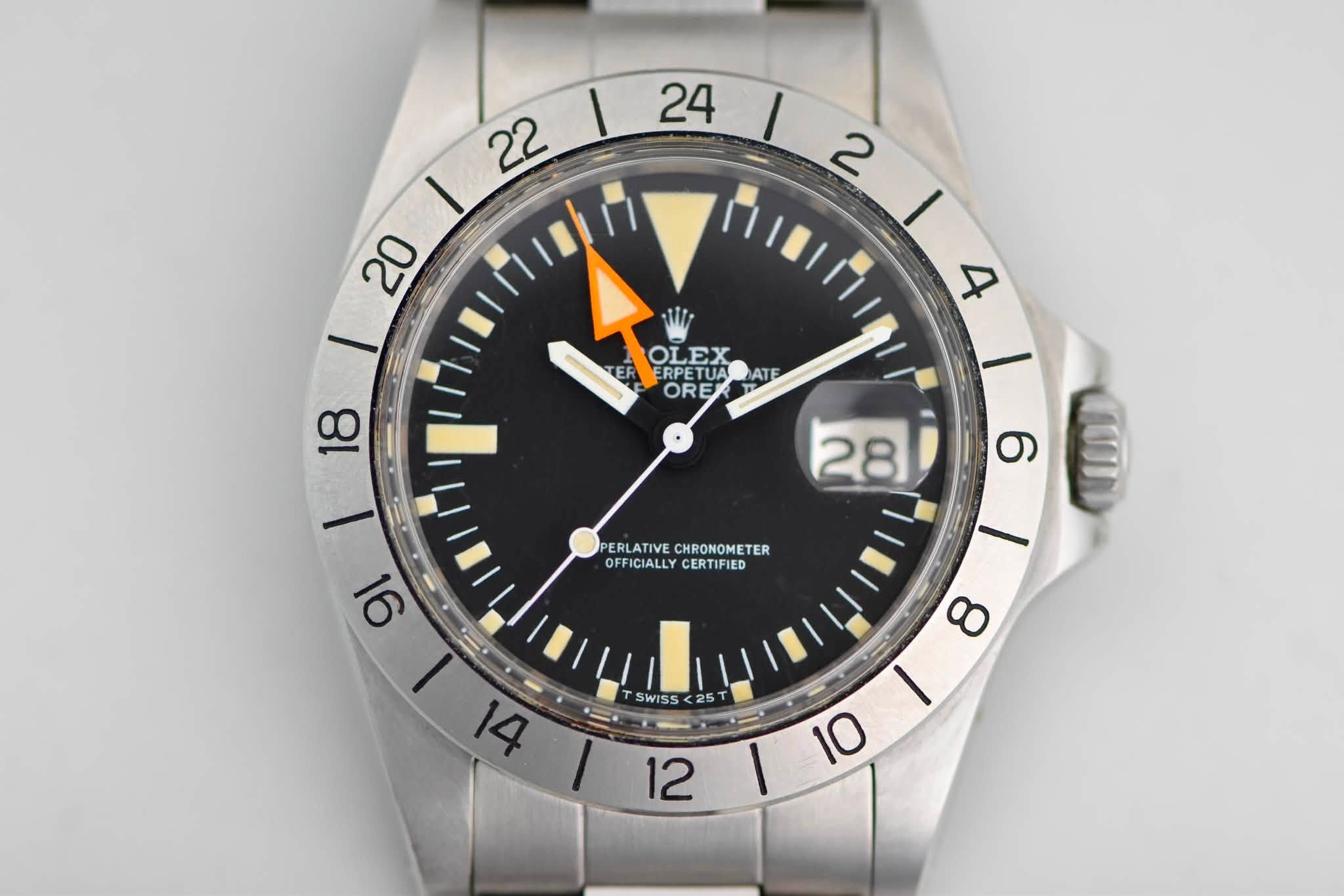 May be an image of wrist watch and text that says '24 I 2 22 I 20 OLEX EK ERPETUA AT ORE 4 18 F 28 PERLATIVE CHRONOMETER PERLATIVECHROMONETER TER OFFICIALLYCERTIFIED OFFICIALLY…