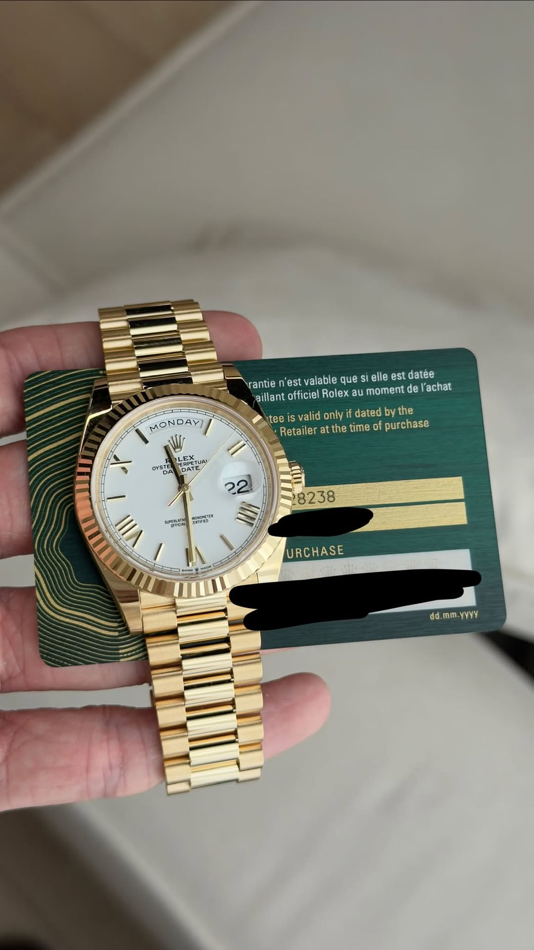 May be an image of wrist watch and text