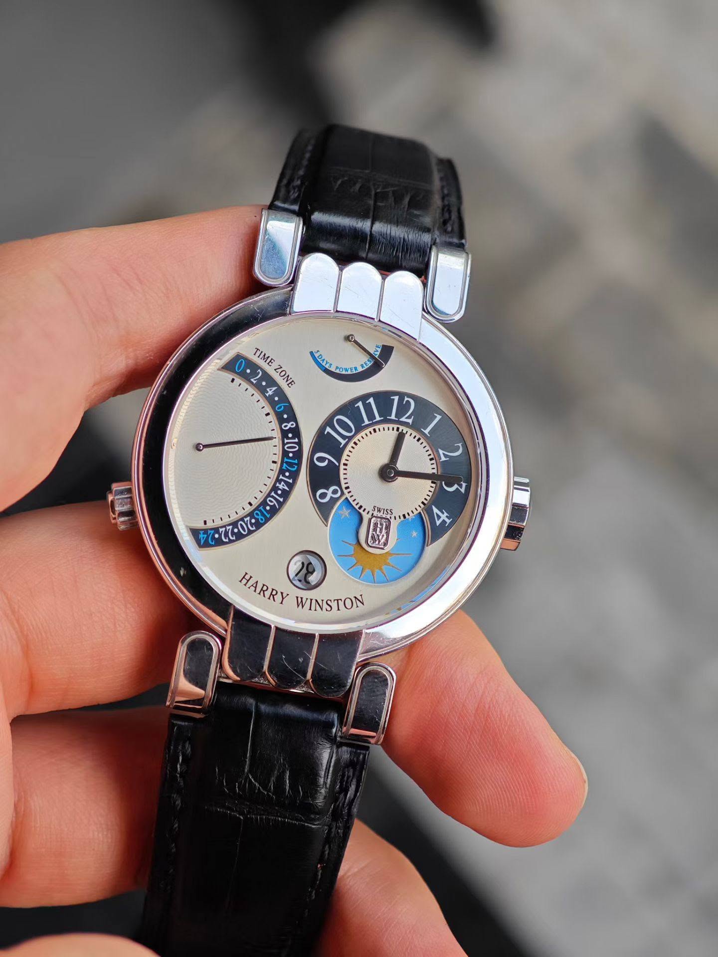 May be an image of wrist watch and text