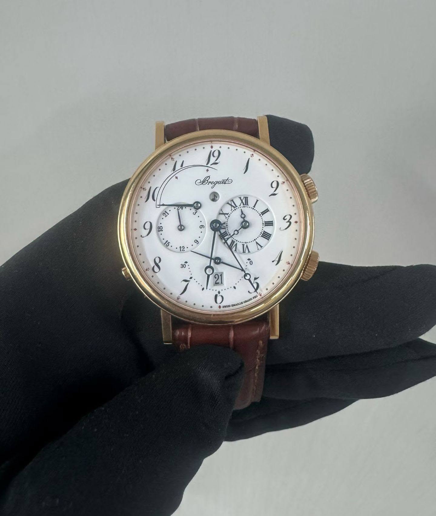 May be an image of wrist watch and text that says 'BToAиo ش F ي ជា .21 و 15. XII + I A 3" ر ه 12 IA ++ 0 สจี้ 8 G 21 :0 5'