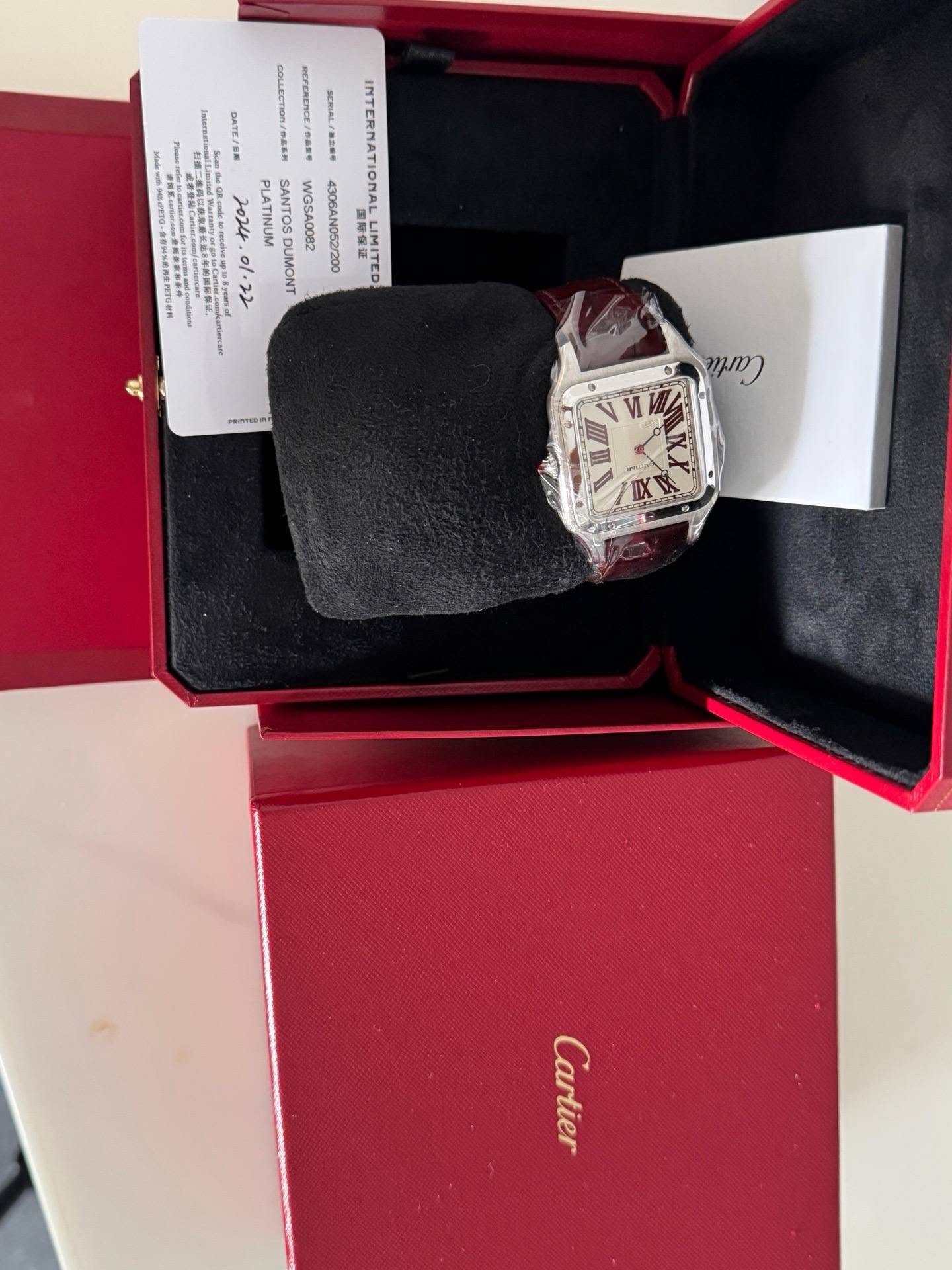 May be an image of wrist watch and text