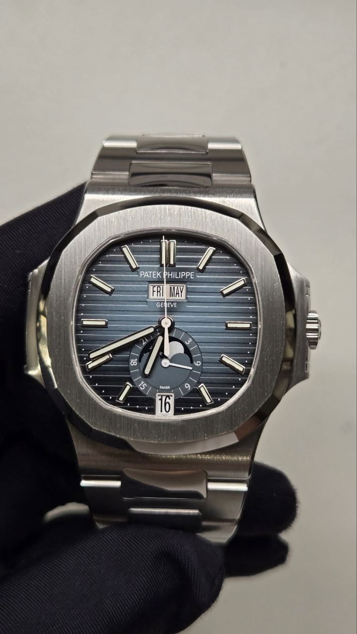 May be an image of wrist watch and text that says 'PATEKPHILIPPE PATEK PHILIPPE EI IPPE FRI FRI_MAY MAY GE EVE < 8L L 3 9 9 I 15 5 SWISS 16 9 I'