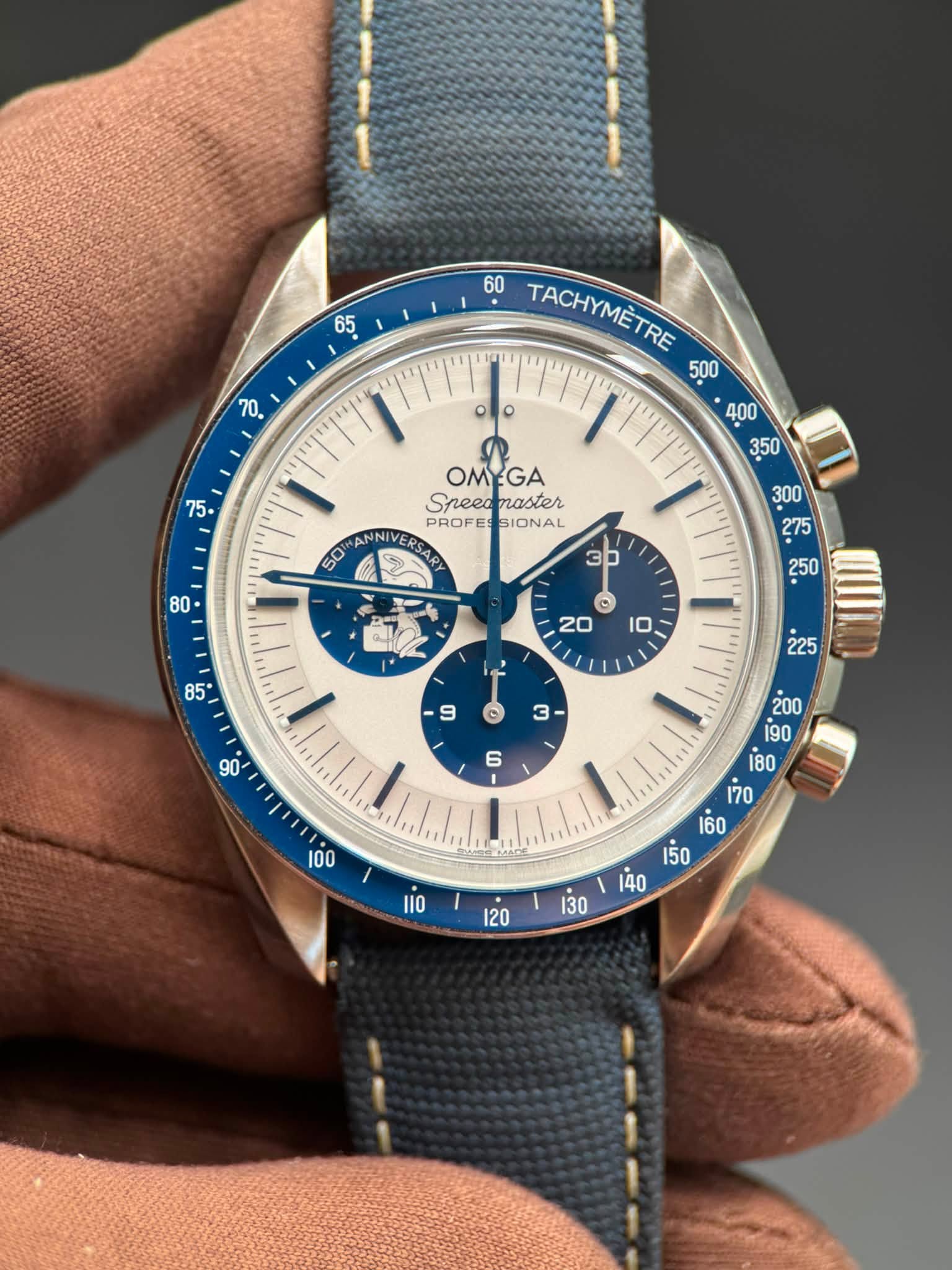 May be an image of wrist watch and text that says ' TACHYMETRE OMEGA Sneed Sreeamaster naster PROFE OFESS ES SIONAL ANN ANNIVER ER ه 20 250 S α''ή. Iifeei เ5ิ '