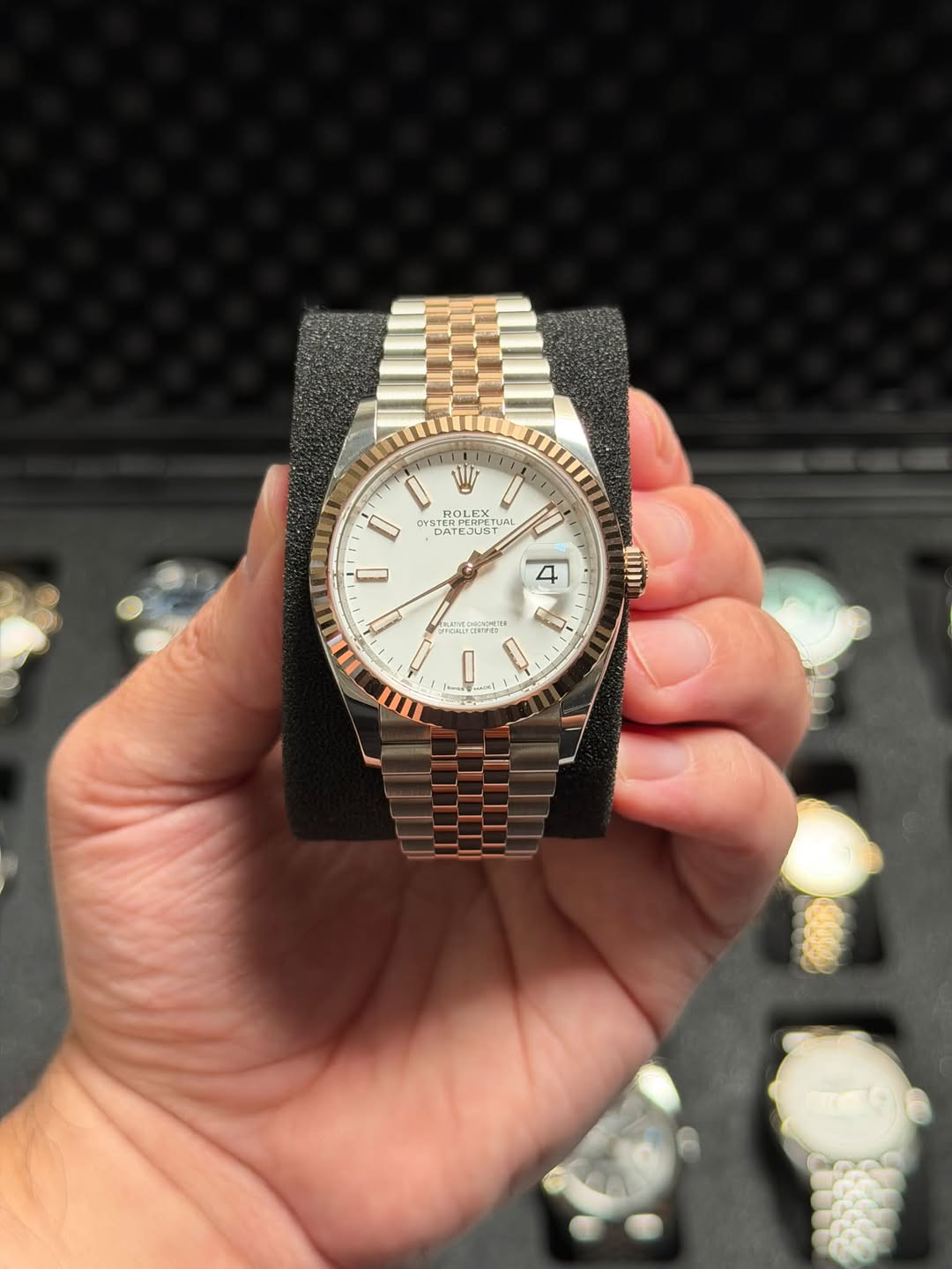 May be an image of wrist watch and text