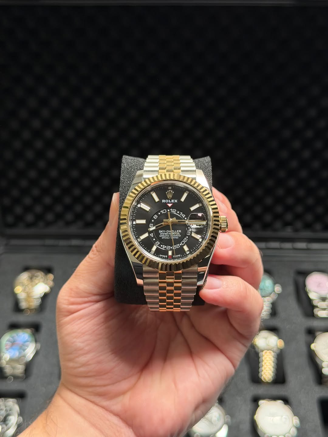 May be an image of wrist watch and text