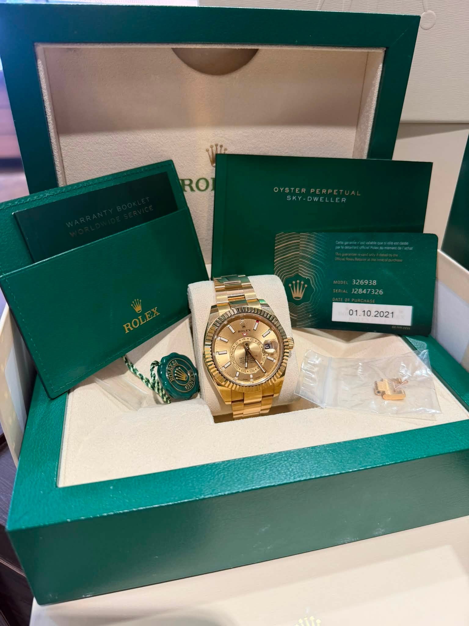 May be an image of wrist watch and text