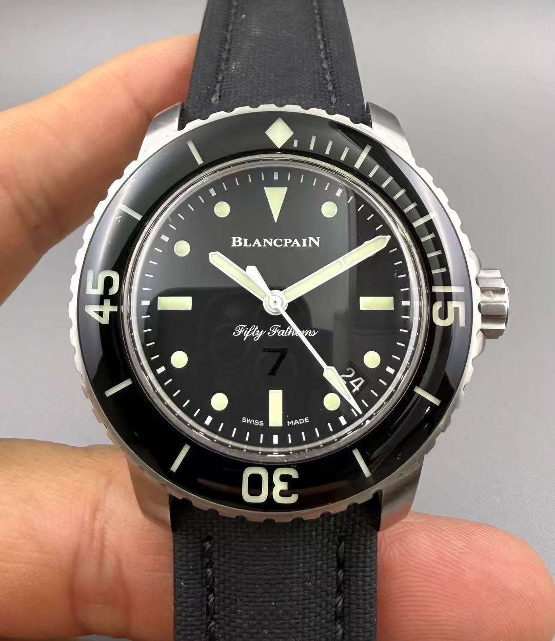 May be an image of wrist watch and text that says 'BLANCPAIN 45 Fifly Falh lFalhams ns 15 4 SWISS MADE'