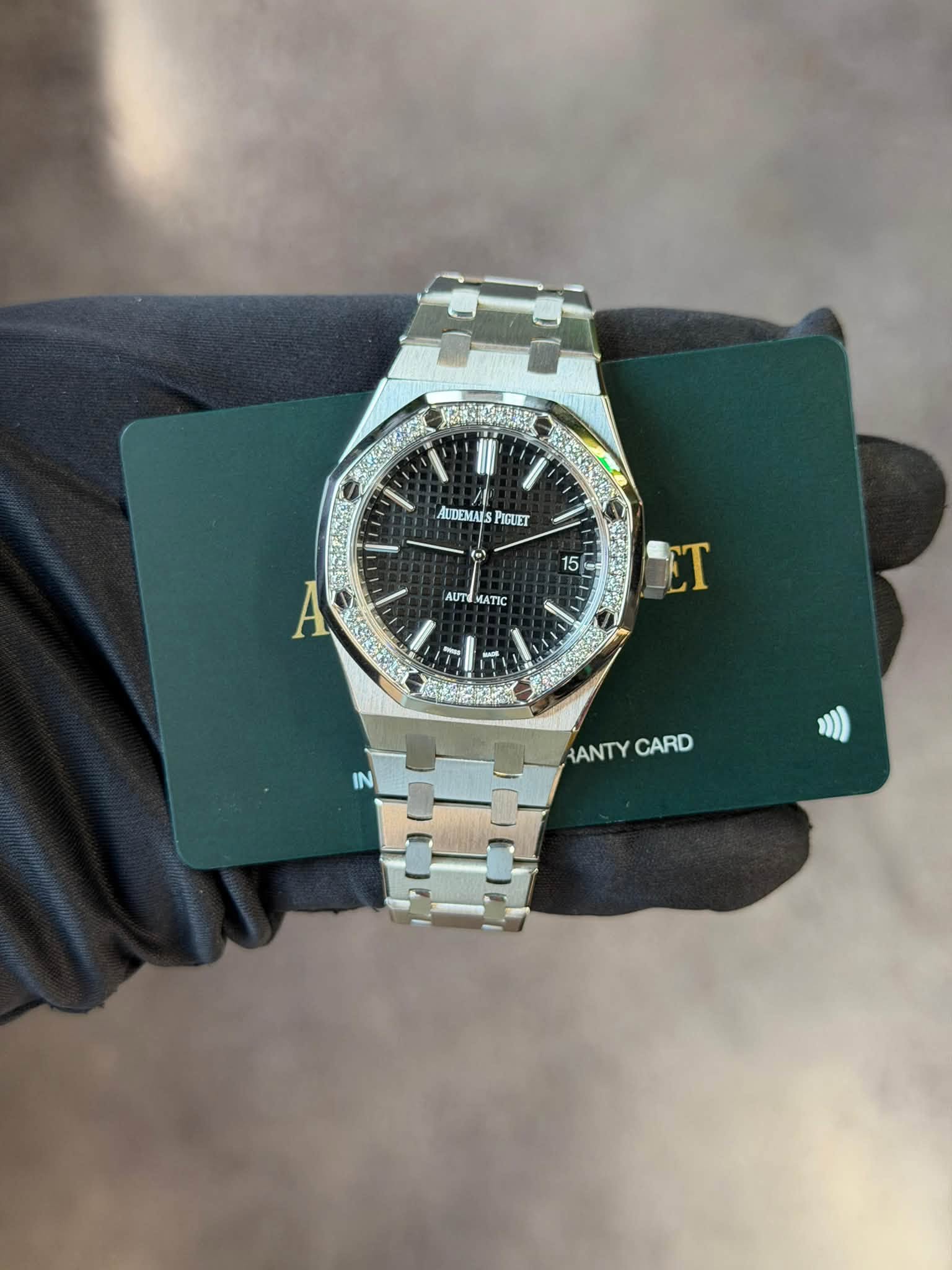 May be an image of wrist watch and text