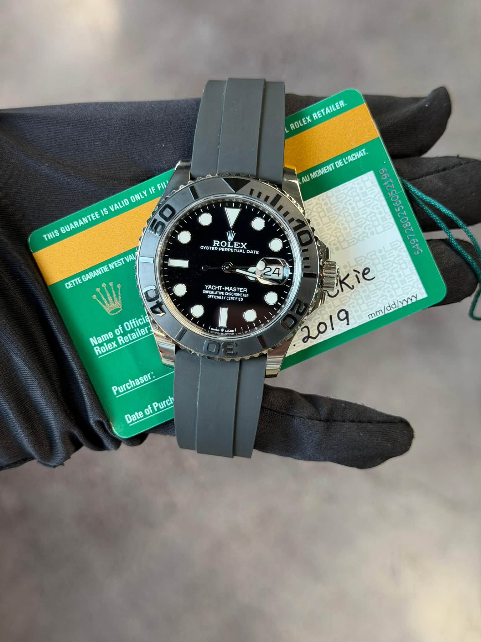 May be an image of wrist watch and text that says 'RETAILER. ROLEX FII ONLY GUARANTEE IS VALID THIS EL'ACHAT. AU 0 MOMENT 10O CYST 費D明す ERRETU TUAL ALDA DATE ROLEX EX ROLE EX X…