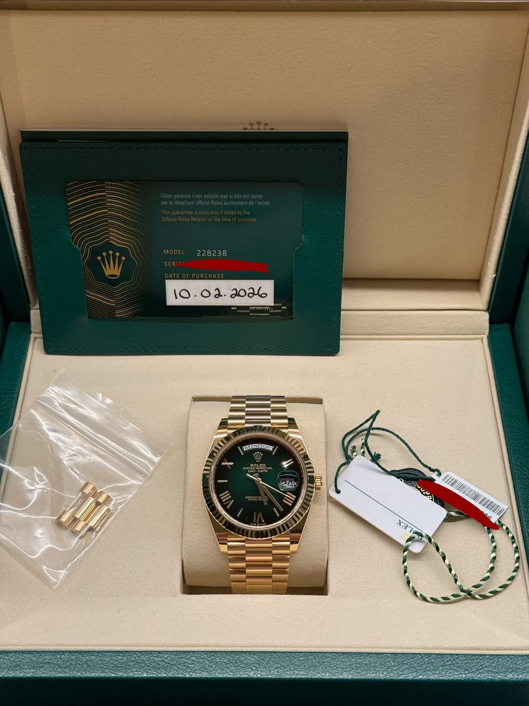 May be an image of wrist watch and text