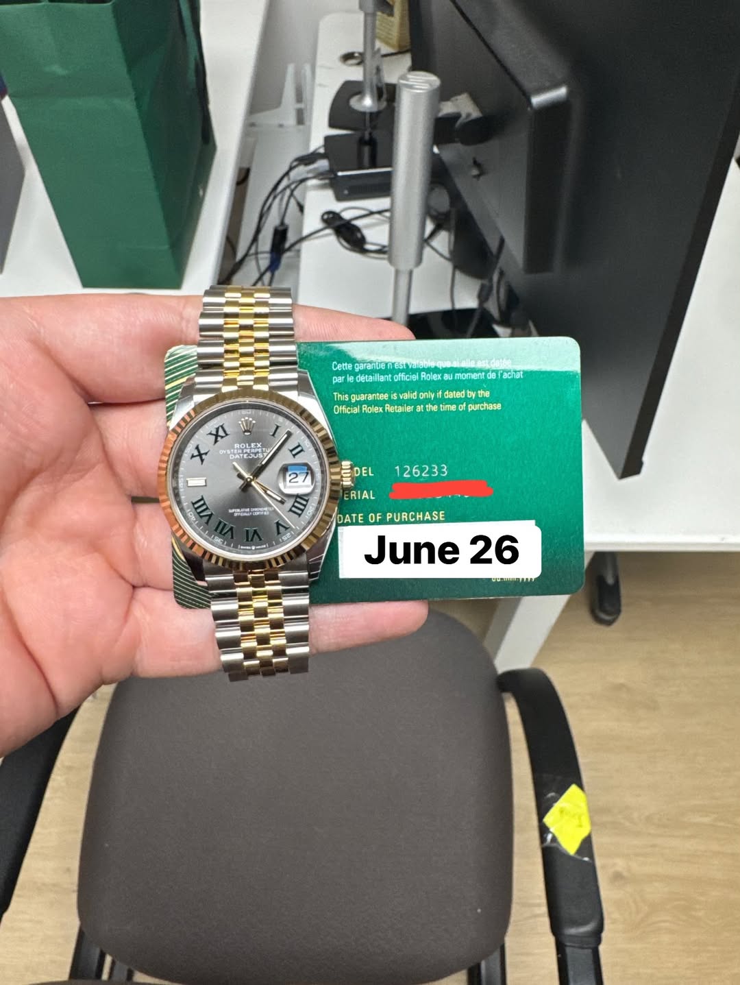 May be an image of wrist watch and text