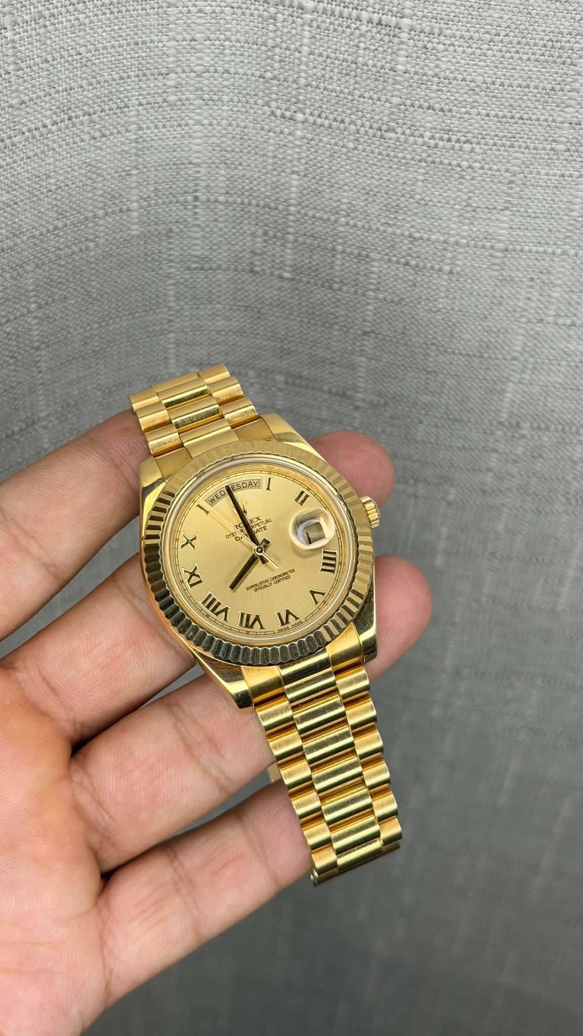 May be an image of wrist watch and text