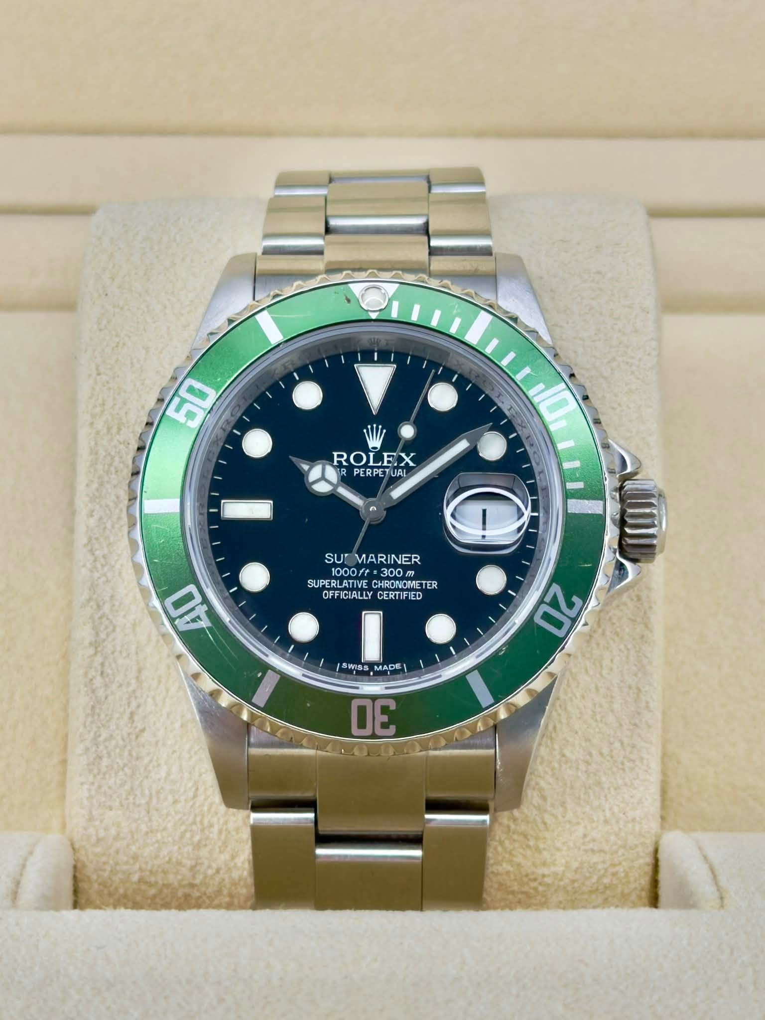 May be an image of wrist watch and text that says '50 10 ROLEX PERPETUAL I SUEMARINER SUT MARINER 1000/ ebи 1000/t.300m 300m Sm SUPERLATIVE SUPERLATIVE CHRDNON CHRONOIE RONOTE TER…