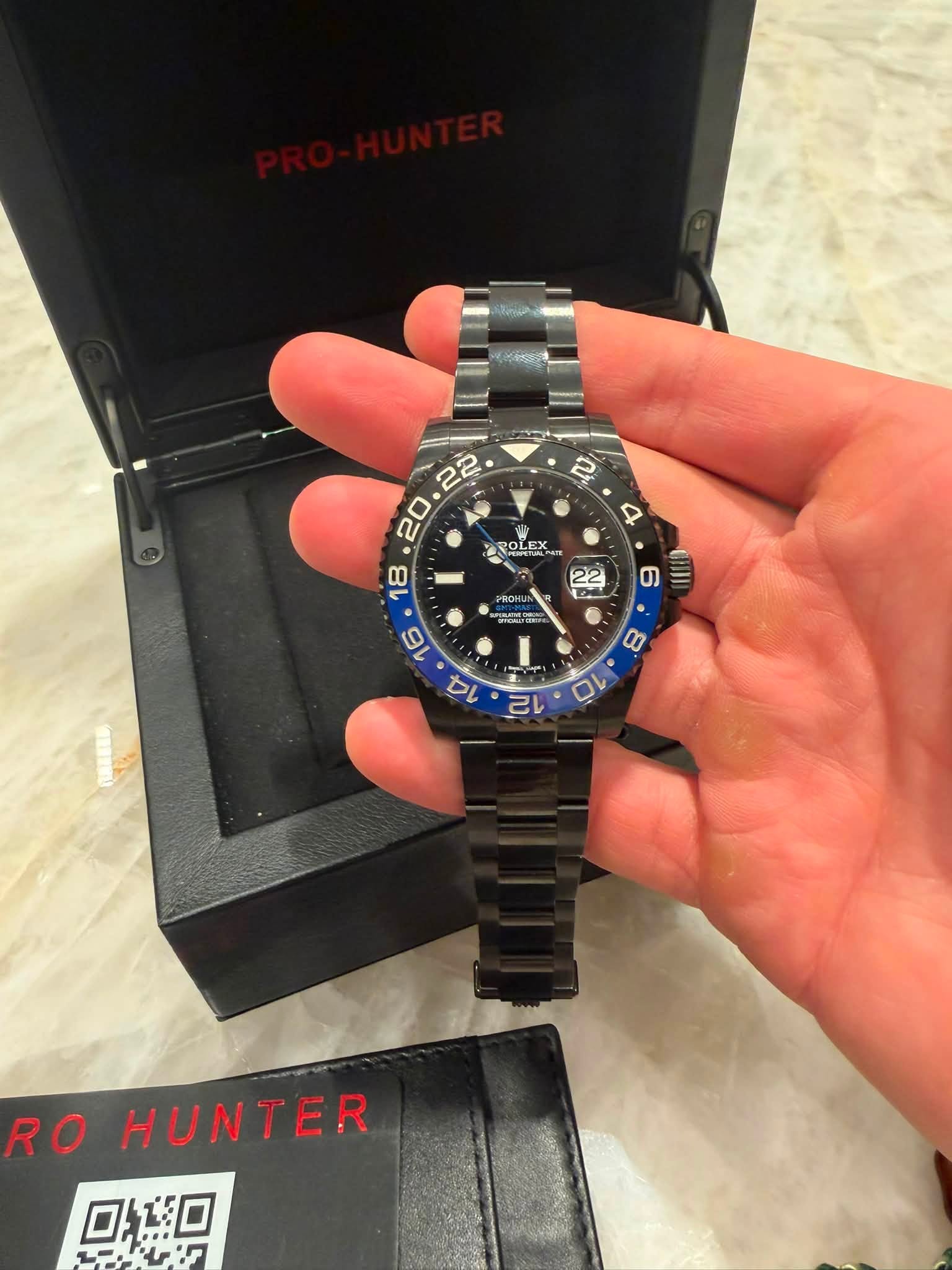 May be an image of wrist watch and text that says '2 4 ROLEX က 6 E HONDO RO HUNTER'