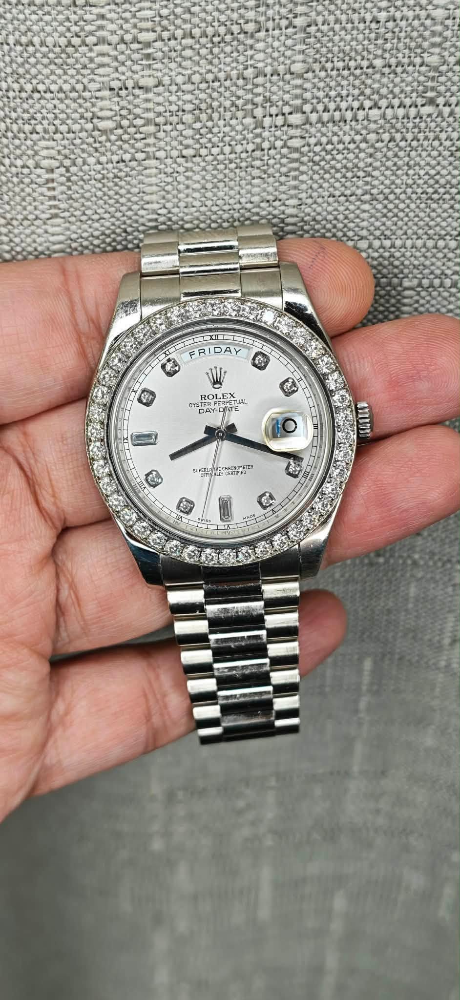 May be an image of wrist watch and text
