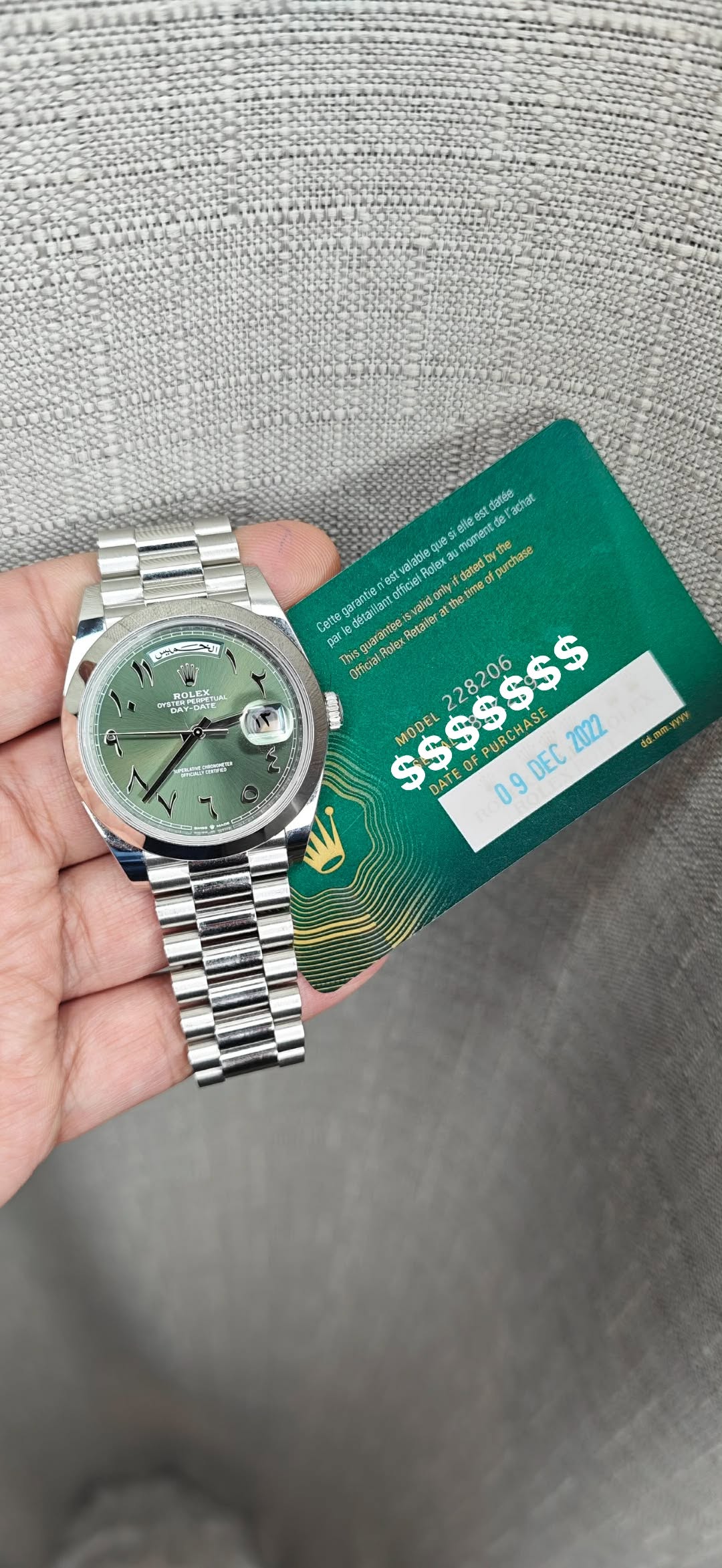 May be an image of wrist watch and text