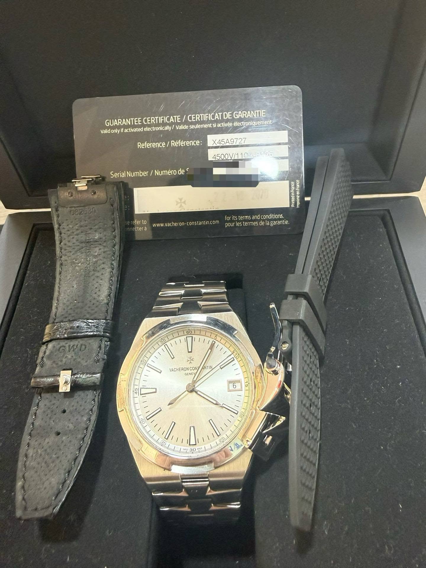 May be an image of wrist watch and text