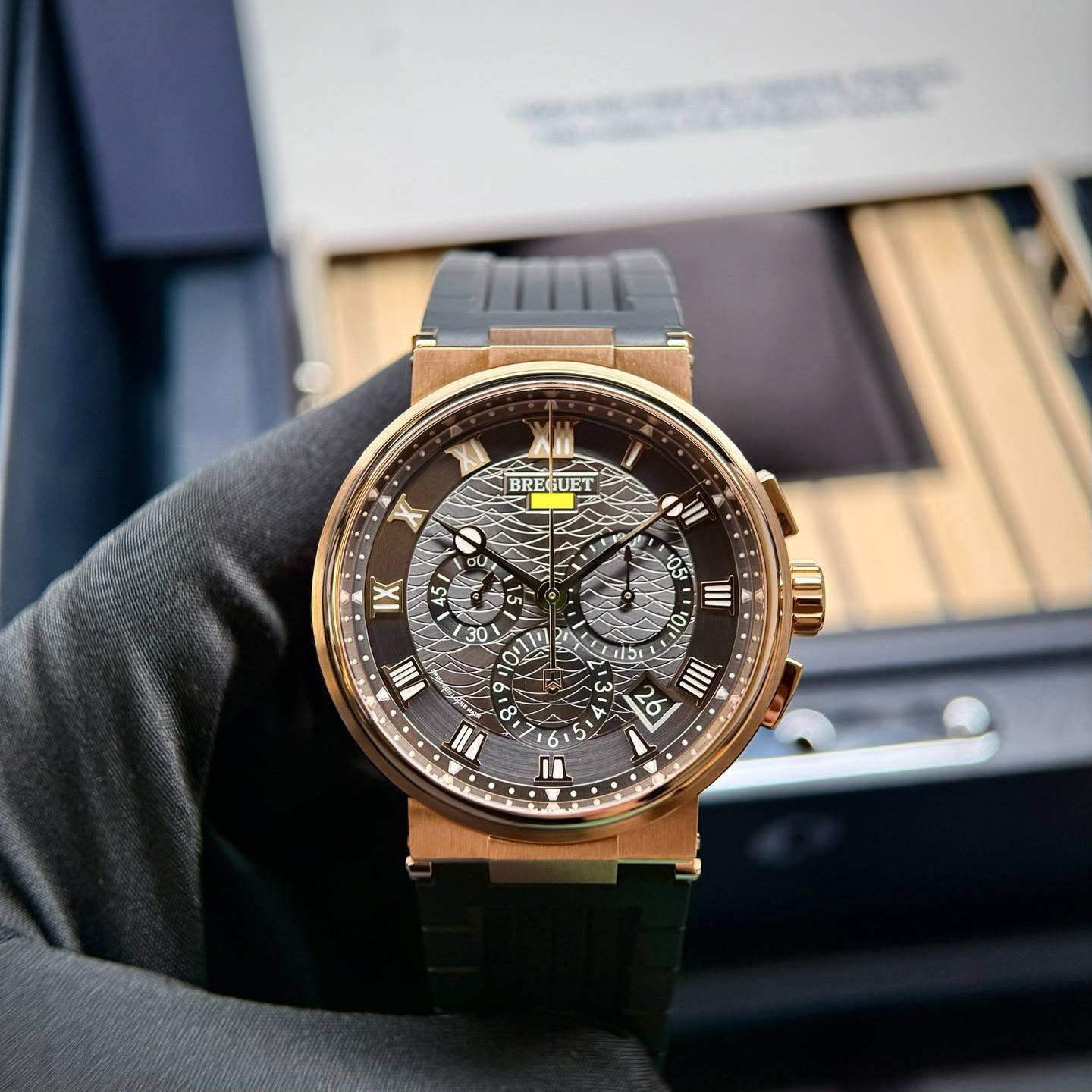 May be an image of wrist watch and text