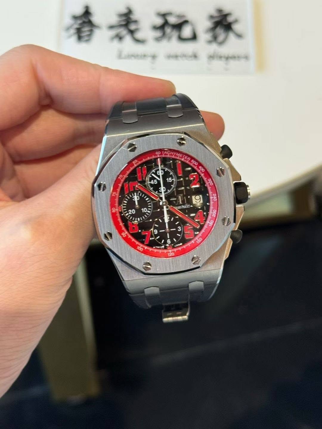 May be an image of wrist watch and text
