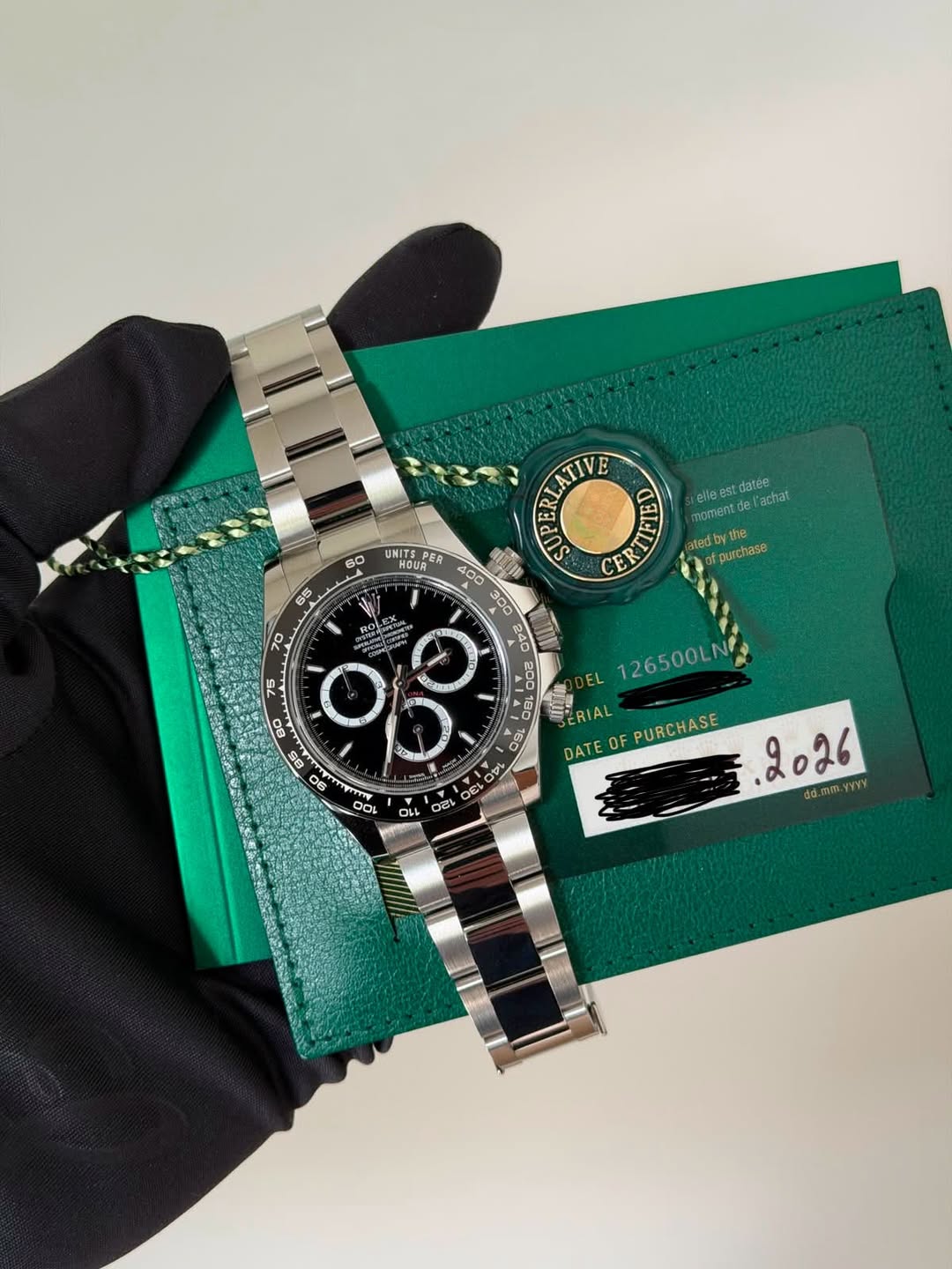 May be an image of wrist watch and text that says '60 d R LATI E ellee datée achat moment C CER RTIFIED CETHE atedby 미빠리 purchase 65 10 75 BO ® B0 06 UNITANE PER 126500LN ERIAL គ…