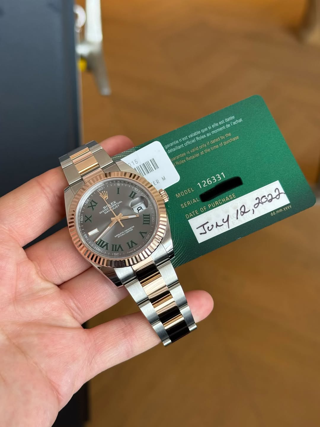 May be an image of wrist watch and text