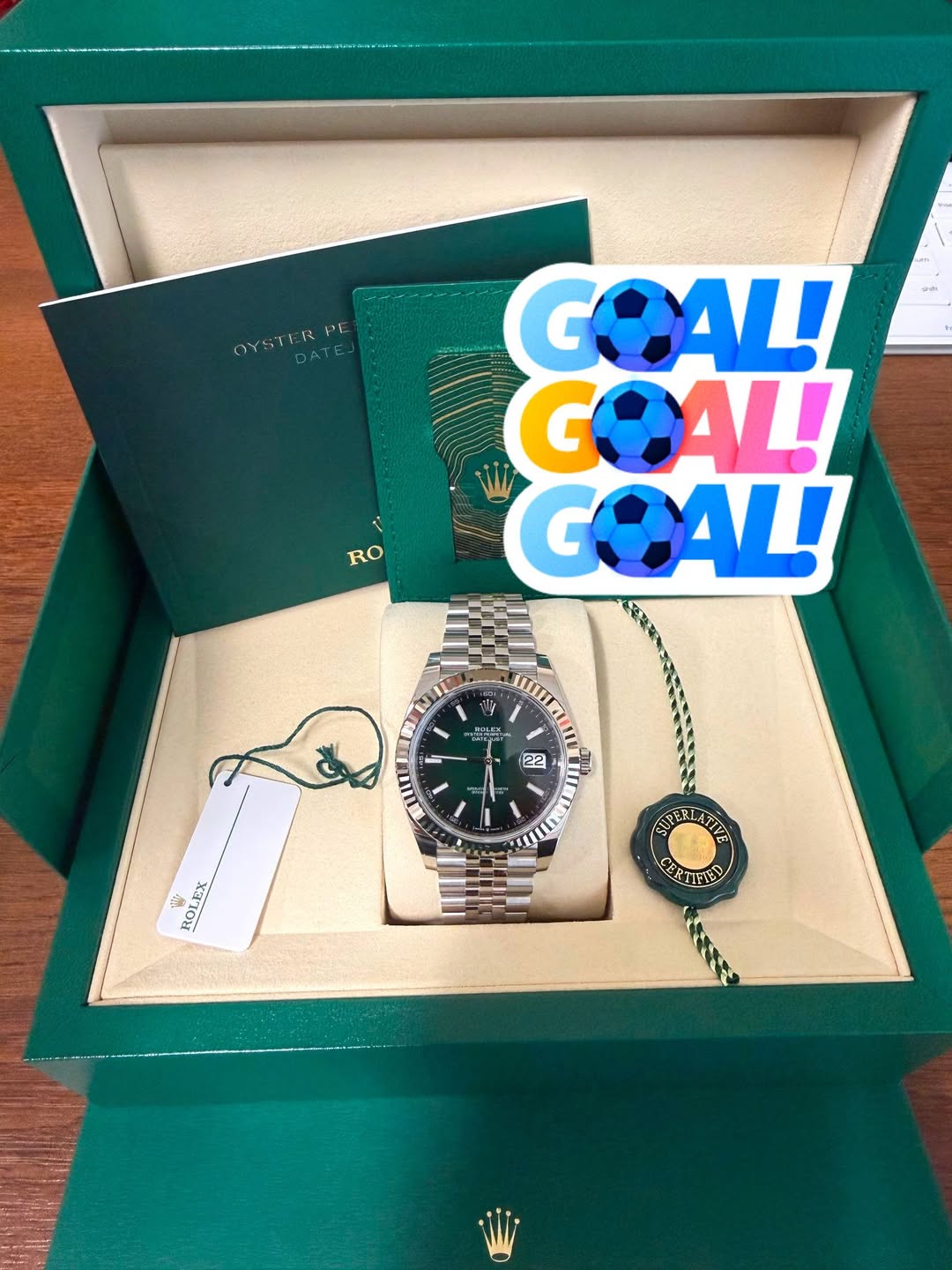 May be an image of wrist watch and text that says 'OYSTER PE R RO GOALI COAL! GOALI OLE 2者 F 22 P ROLEA EX PERLATIVE CERI CERITERO ውያገ'