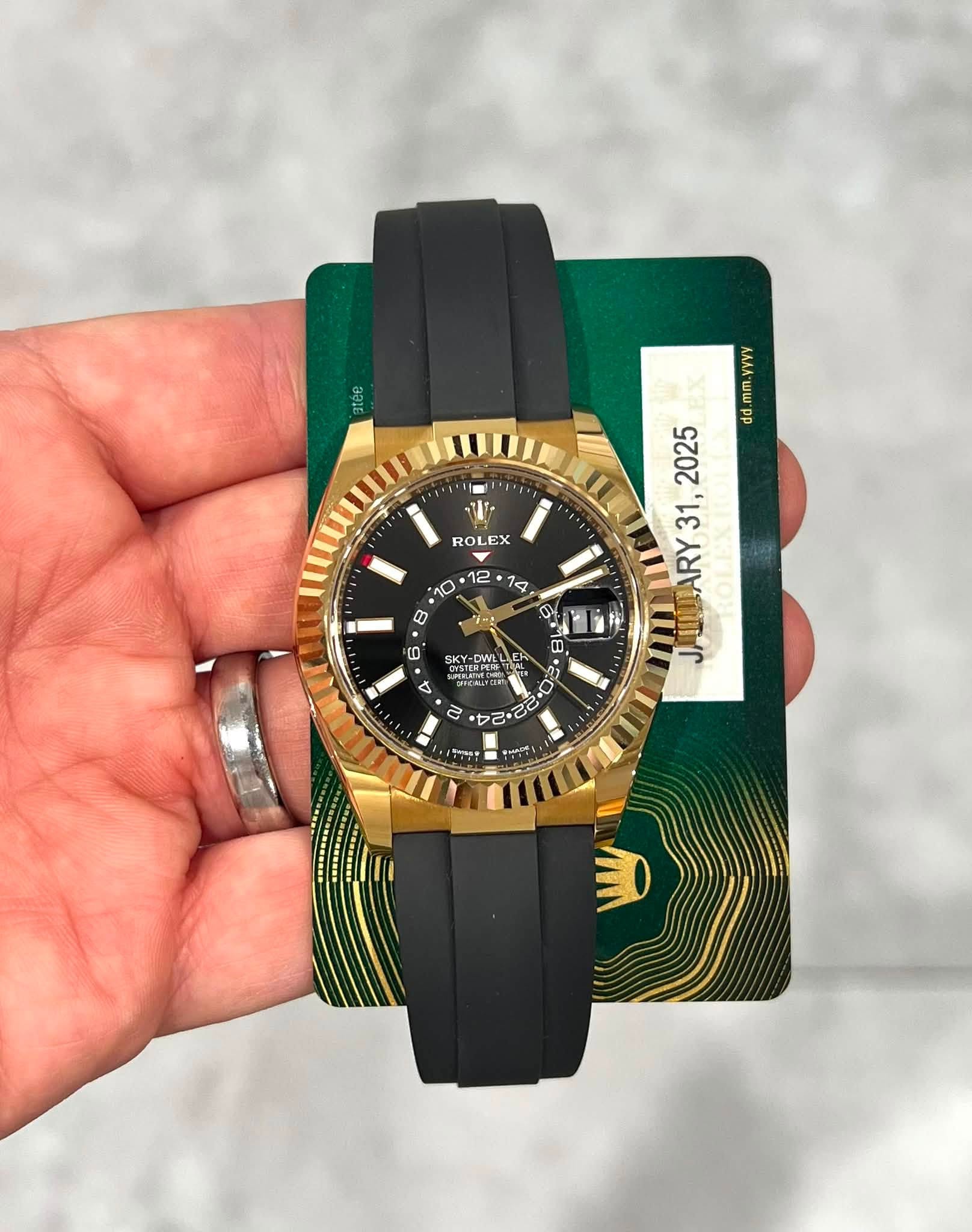 May be an image of wrist watch and text