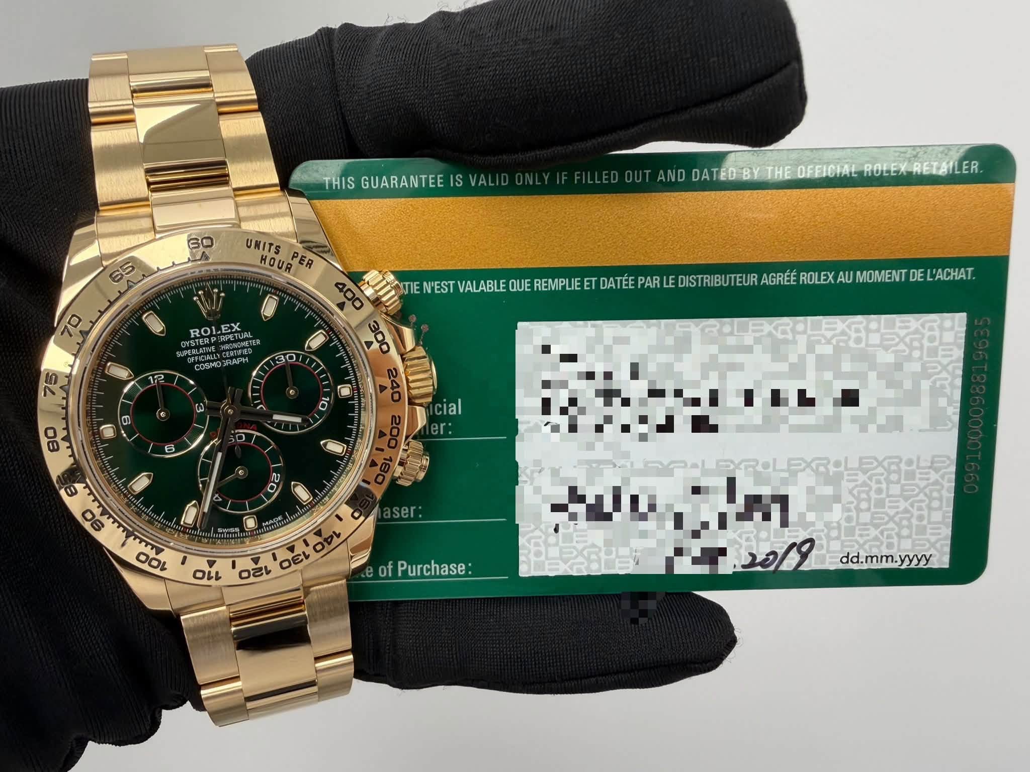 May be an image of wrist watch and text that says 'THIS GUARANTEE IS AL 60 65 AND DATEDBY HIDDATEDaYTHEOEBOIMEROEXRETE THE OFFICIAL ROLEXRETAILER 70 ROLEX SUPERLATI 12 UNITS HOUR…