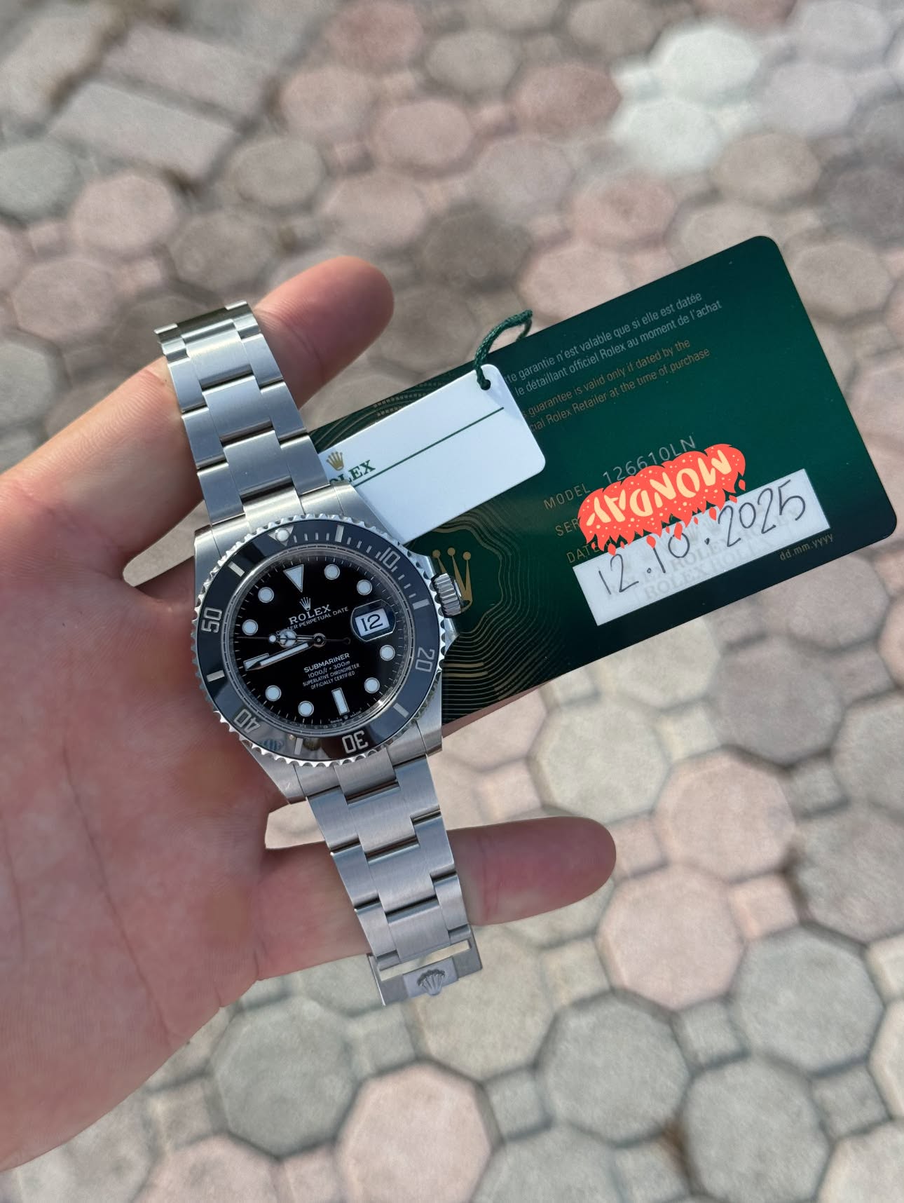 May be an image of wrist watch and text