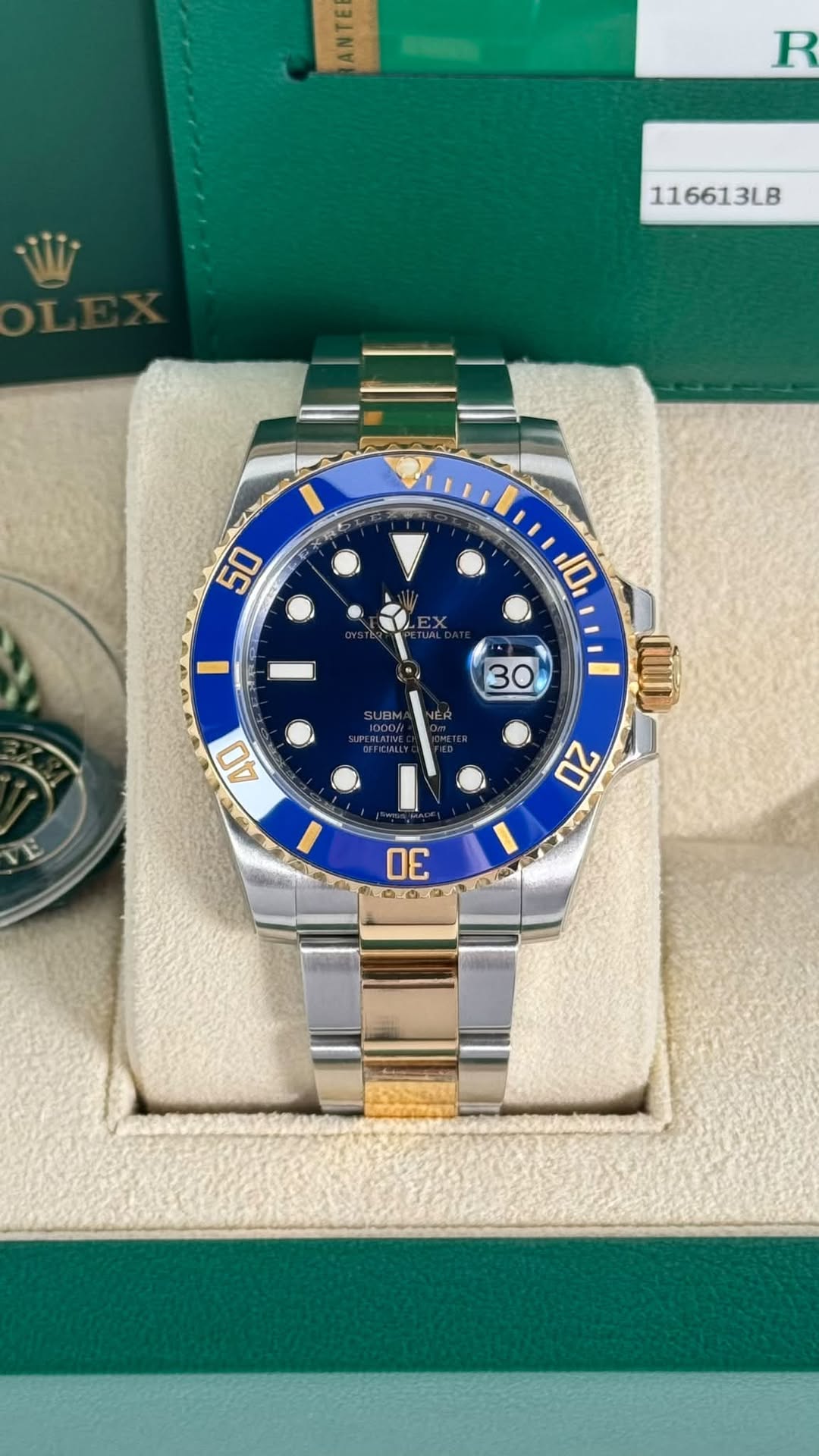 May be an image of wrist watch and text that says 'R 116613LB e 米袋者 50 10 1 IE SUBN 30 良 SEFICWILL 40 យ 20 ៣'