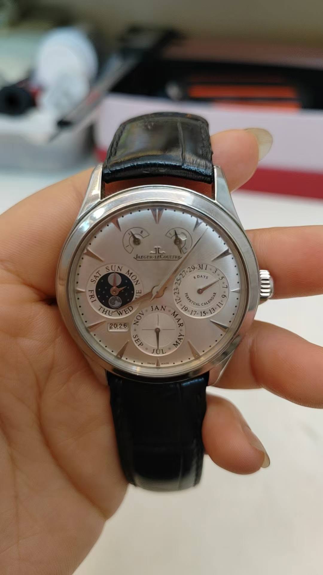 May be an image of wrist watch and text