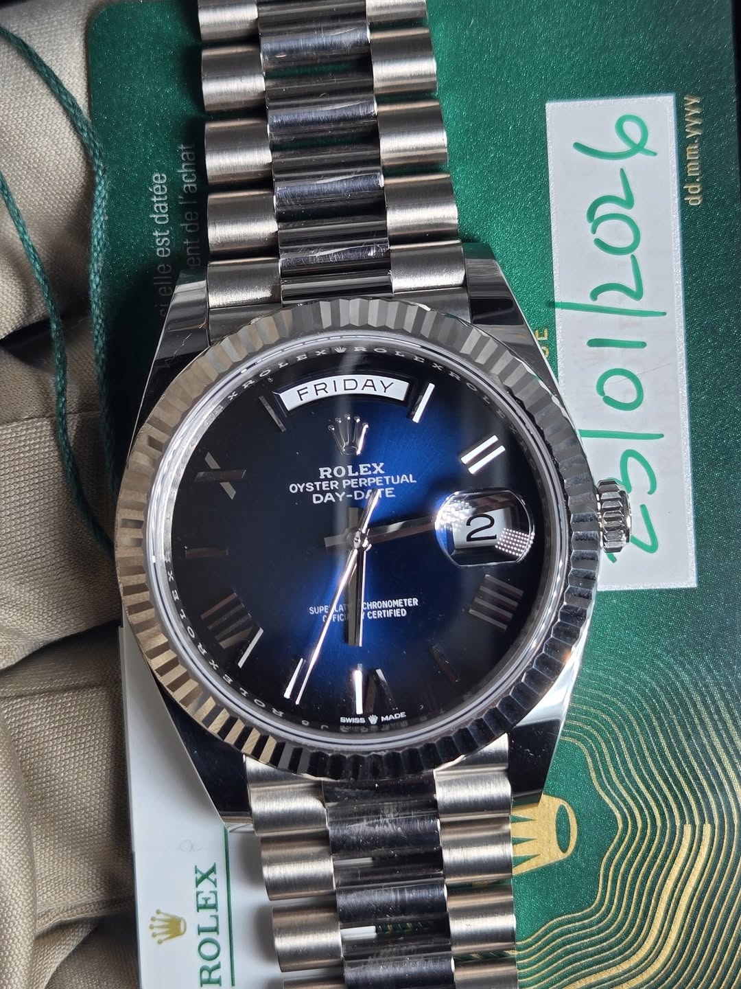 May be an image of wrist watch and text