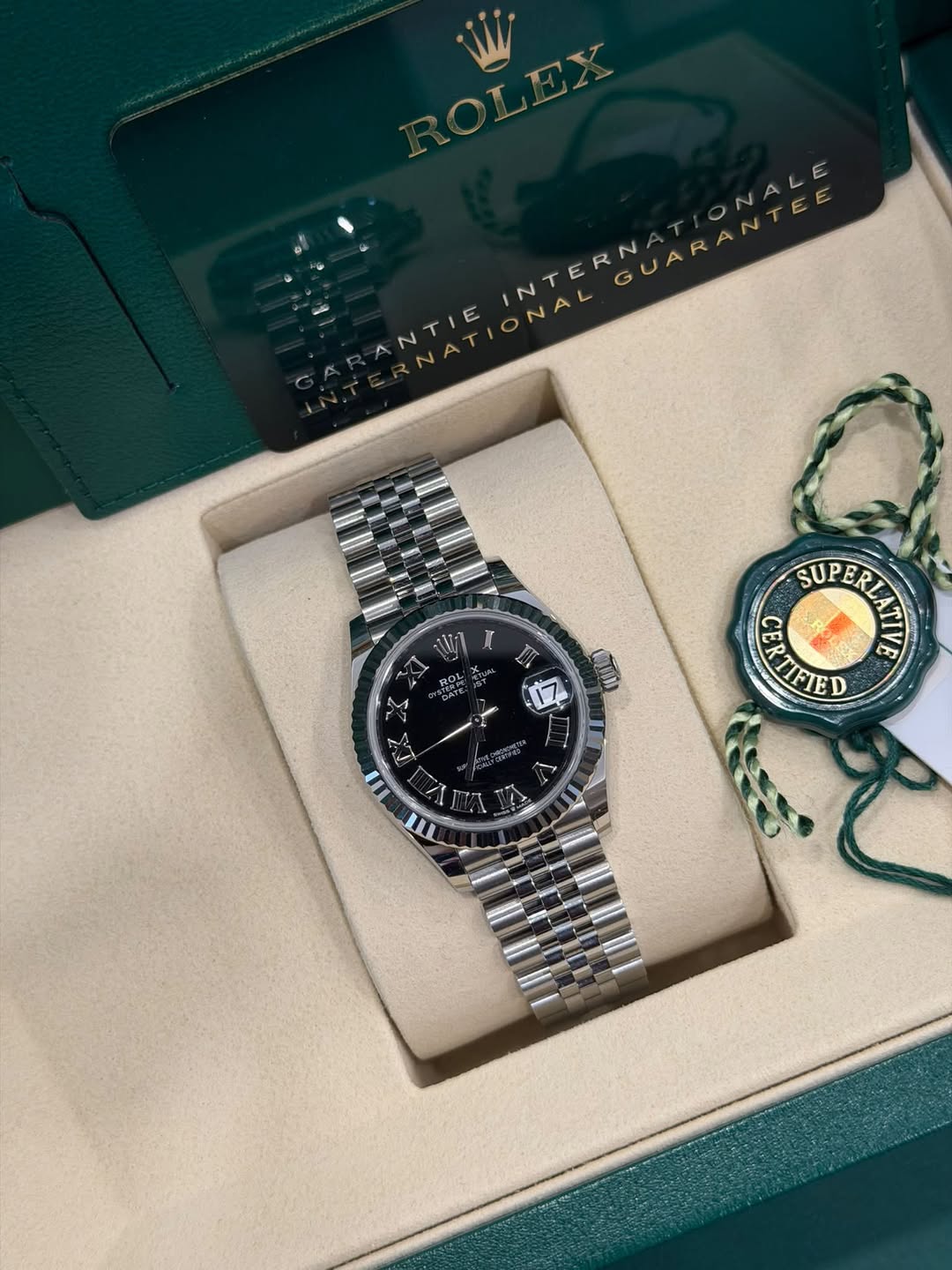 May be an image of wrist watch and text that says 'ONALE G N NAL NTIE SUP SUPERI SUPERAA R CARTIFIED TIFIED D BoC ב'